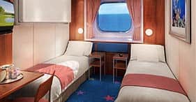 Norwegian Dawn cruise ship Oceanview Stateroom with two beds and picture window.