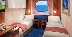 Norwegian Dawn cruise ship Oceanview Stateroom with two beds and picture window.