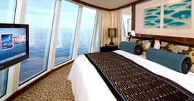 Norwegian Epic cruise ship Deluxe Owner's Suite with all around floor-to-ceiling
