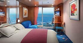 Norwegian Gem cruise ship Balcony Stateroom with floor-to-celling glass doors an