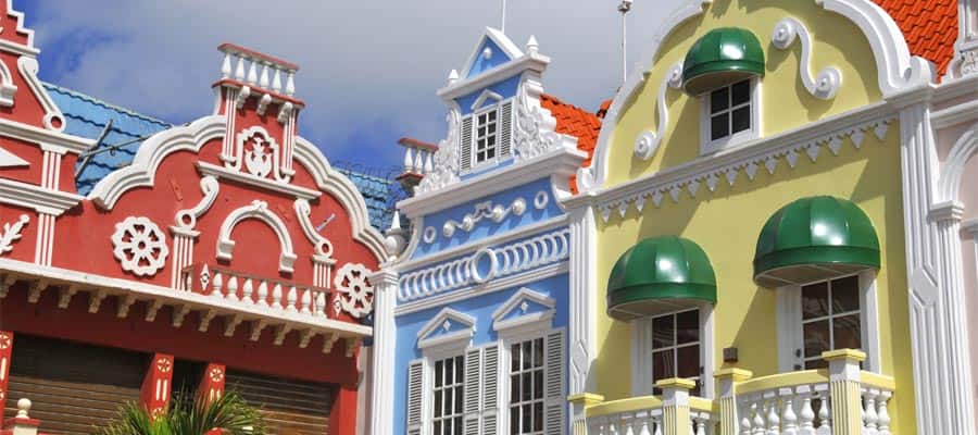 Pastel colored buildings in a Oranjestad cruise