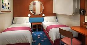 Pride of America cruise ship Inside Stateroom with two beds.