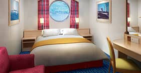Norwegian Sky cruise ship Oceanview Stateroom with two beds, sitting area, and p