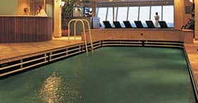 Norwegian Star cruise ship Indoor Lap Pool and Jacuzzi with heated water.
