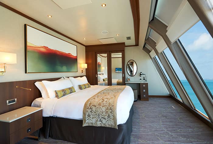Deluxe Owner's Suite Bedroom on Norwegian Dawn