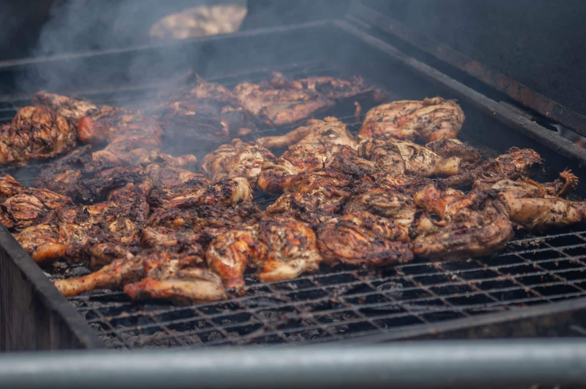 Jerk Chicken Cooking on a BBQ at Notting Hill Carnival 2023