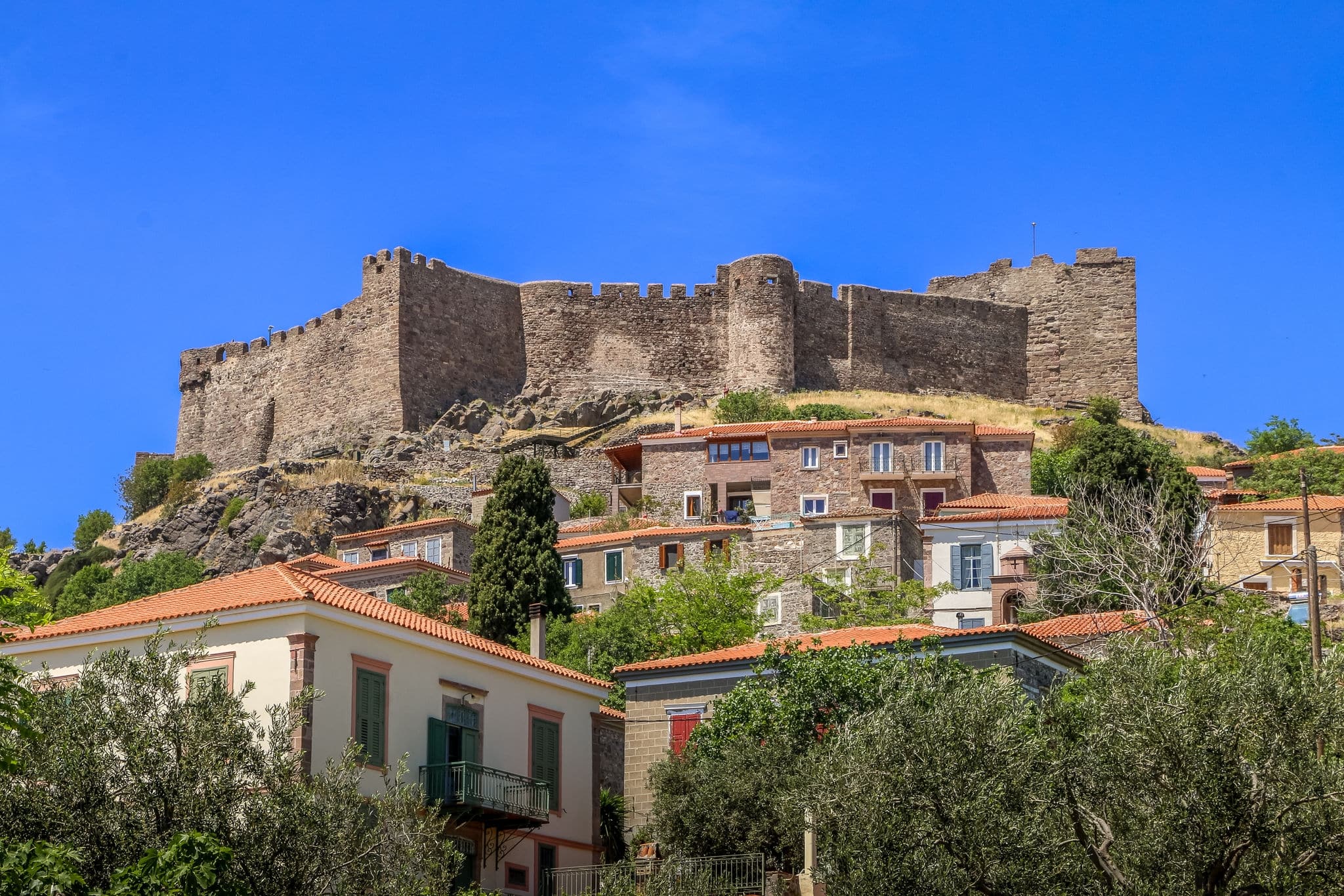 MOLYVOS, LESVOS ISLAND, GREECE Panoramic view of Molyvos village with its medieval castle.