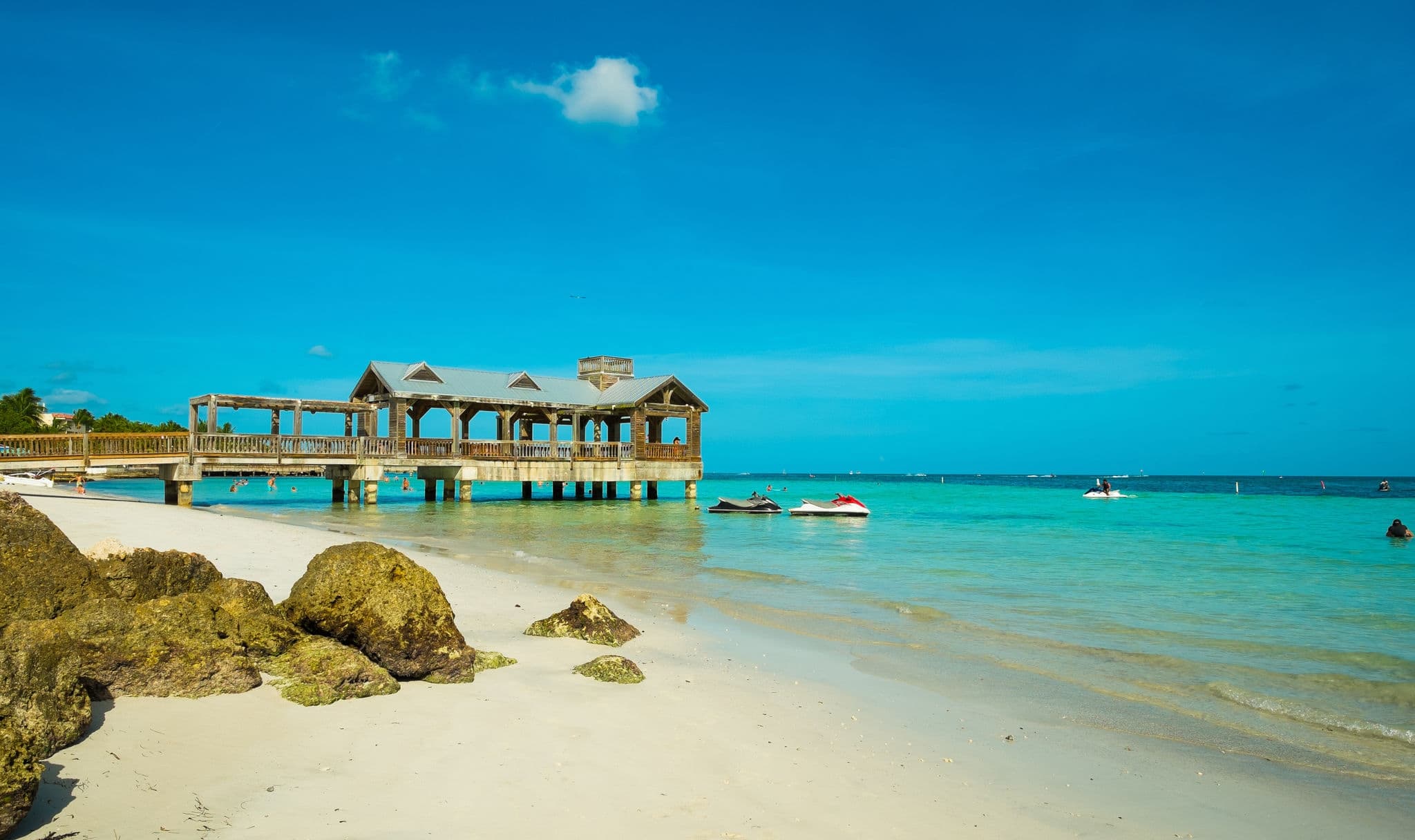 Beautiful Florida Keys beach with covered pier along the shoreline.