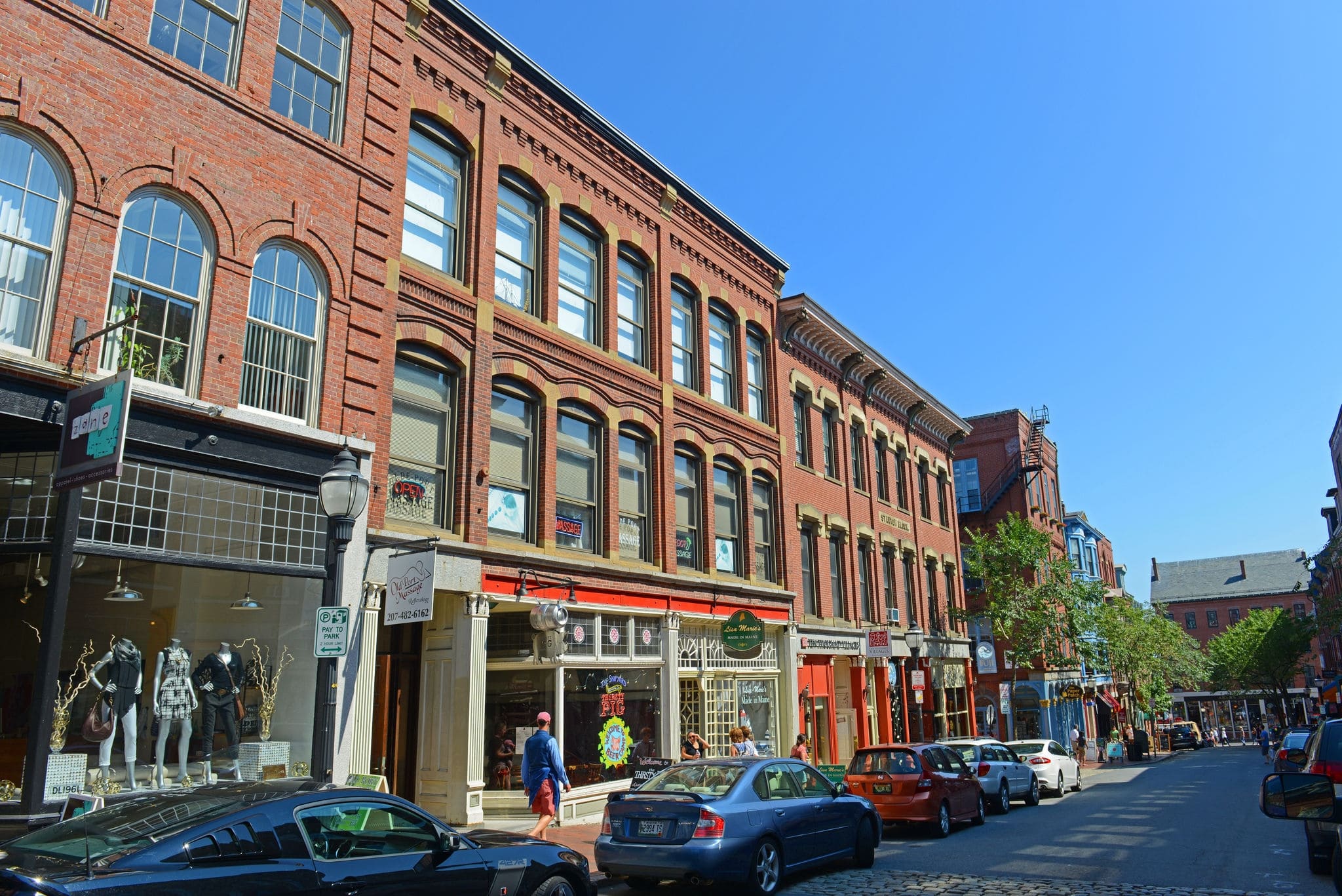 PORTLAND, ME, USA - AUG 24, 2014: Portland Exchange Street at Old Port, Portland, Maine, USA. Old Port is filled with 19th century brick buildings and is now the commercial center of the city.