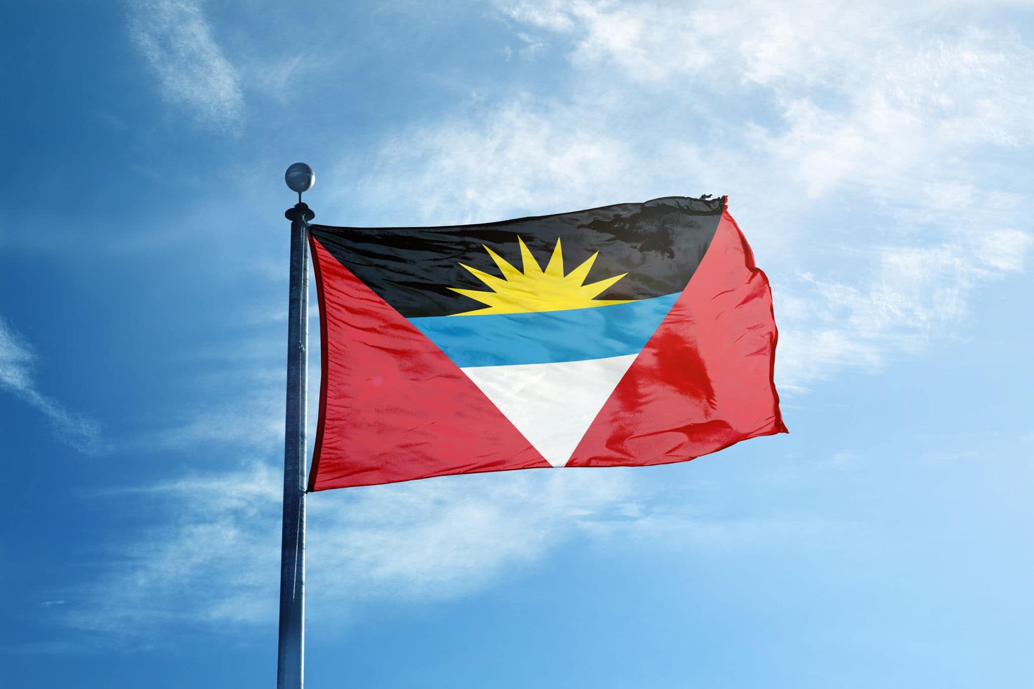Flag of  Antigua and Barbuda on the mast
