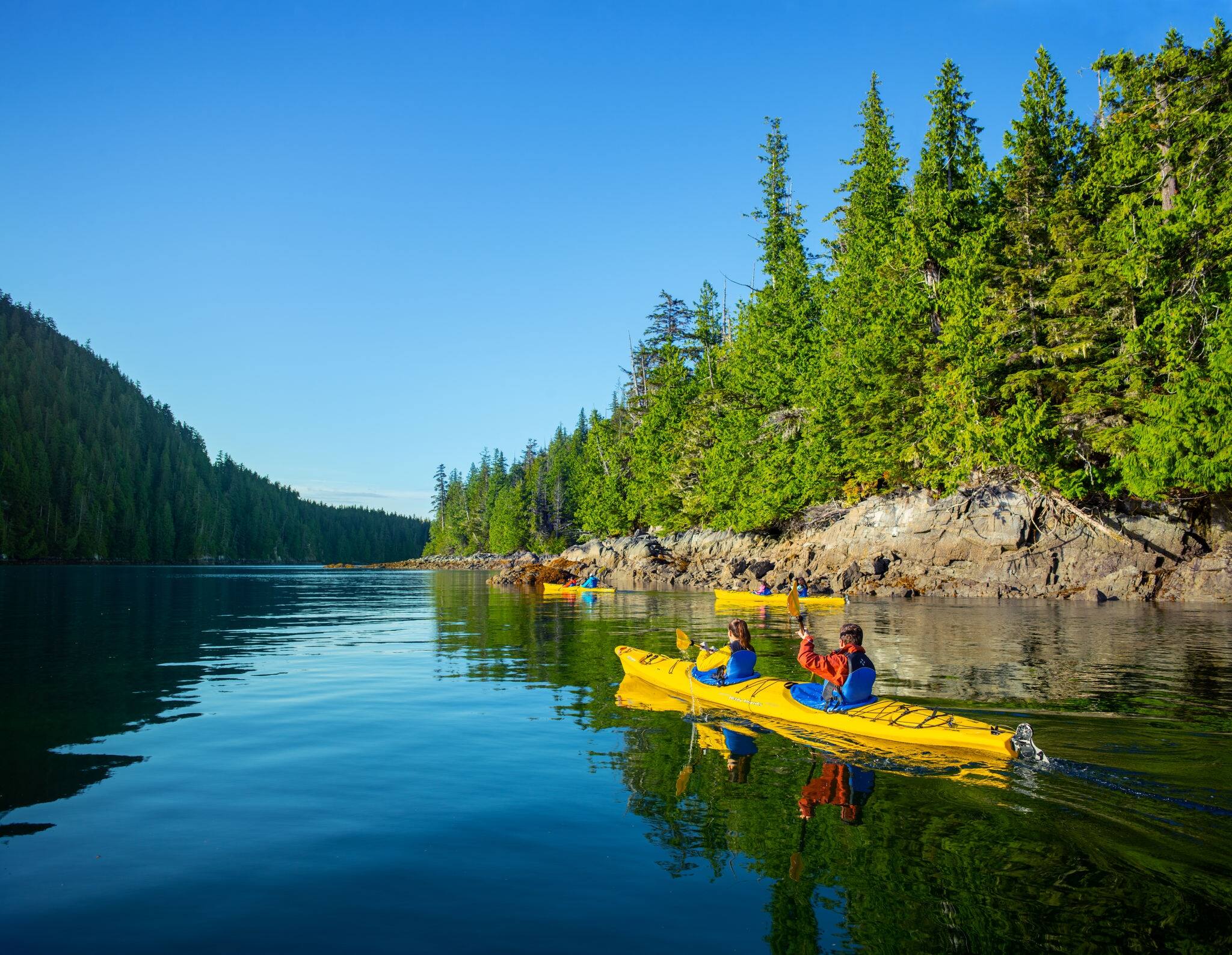 Tourists kayaking in Alaska