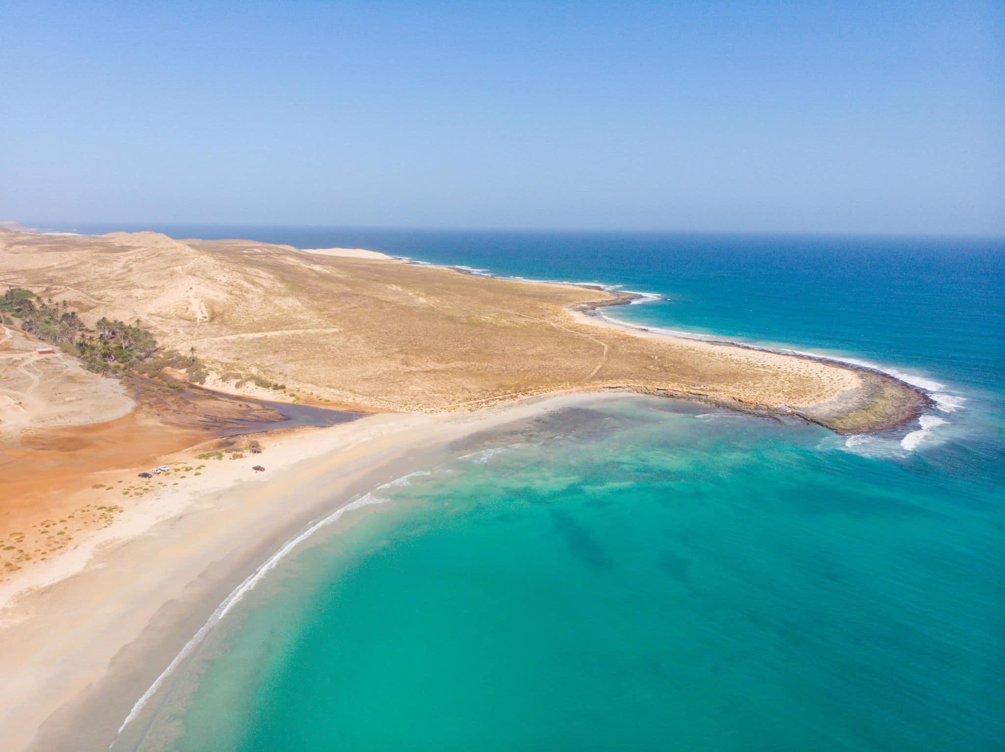 Coast of Boa Vista - paradise island next to the west coast of Africa. Nice waves and surf around the shore of Cape Verde island. Drone image of the Boa vista coast. Perfect sunny weather!