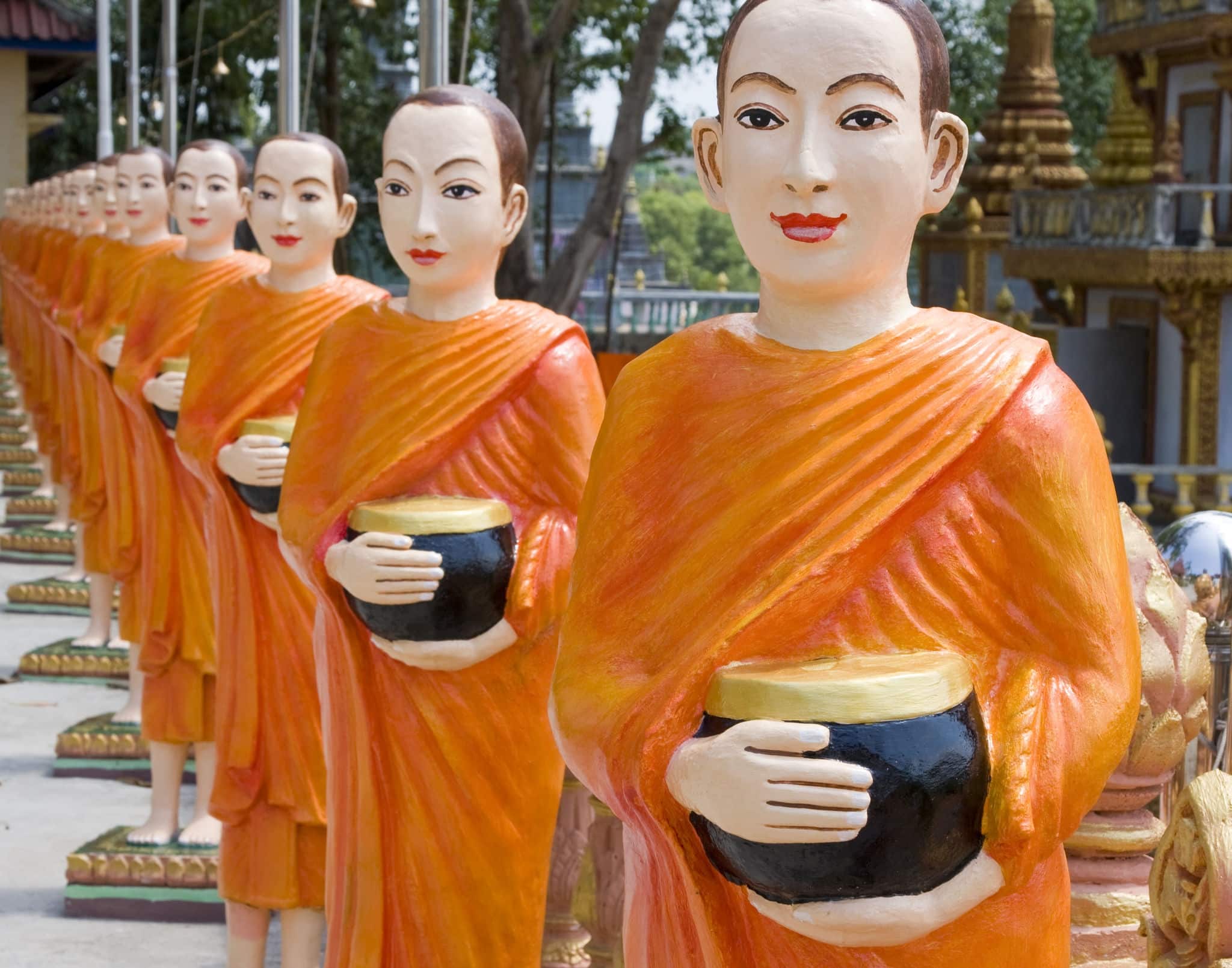 The image of monks in a Buddhist Temple in Sihanouk Ville, Cambodia.