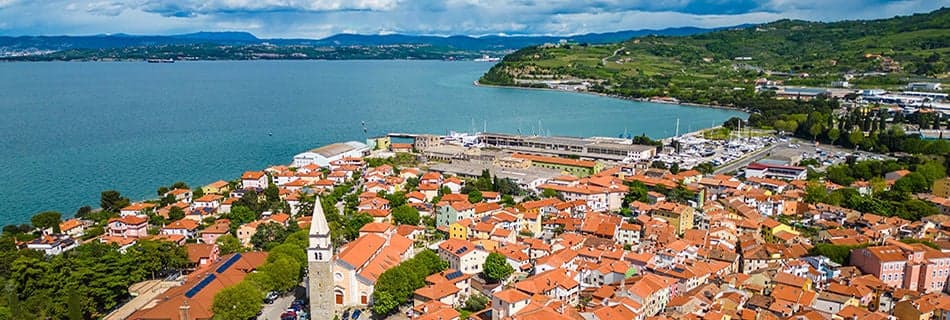 Izola, a charming city nestled along the Adriatic Sea in Slovenia, captivates visitors with its timeless allure and picturesque coastal scenery. Drone photos