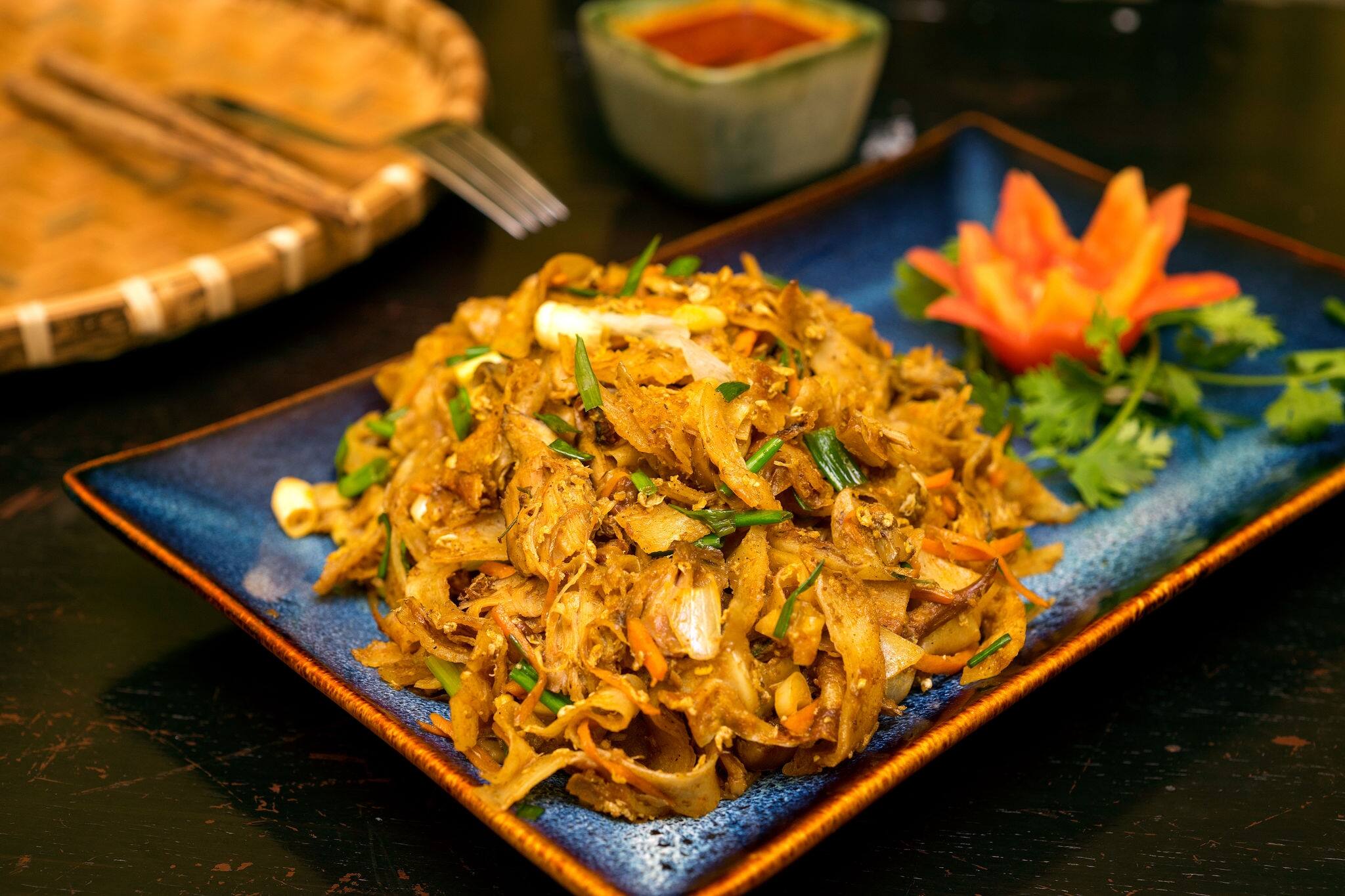 Traditional Sri Lankan kottu roti in wooden background