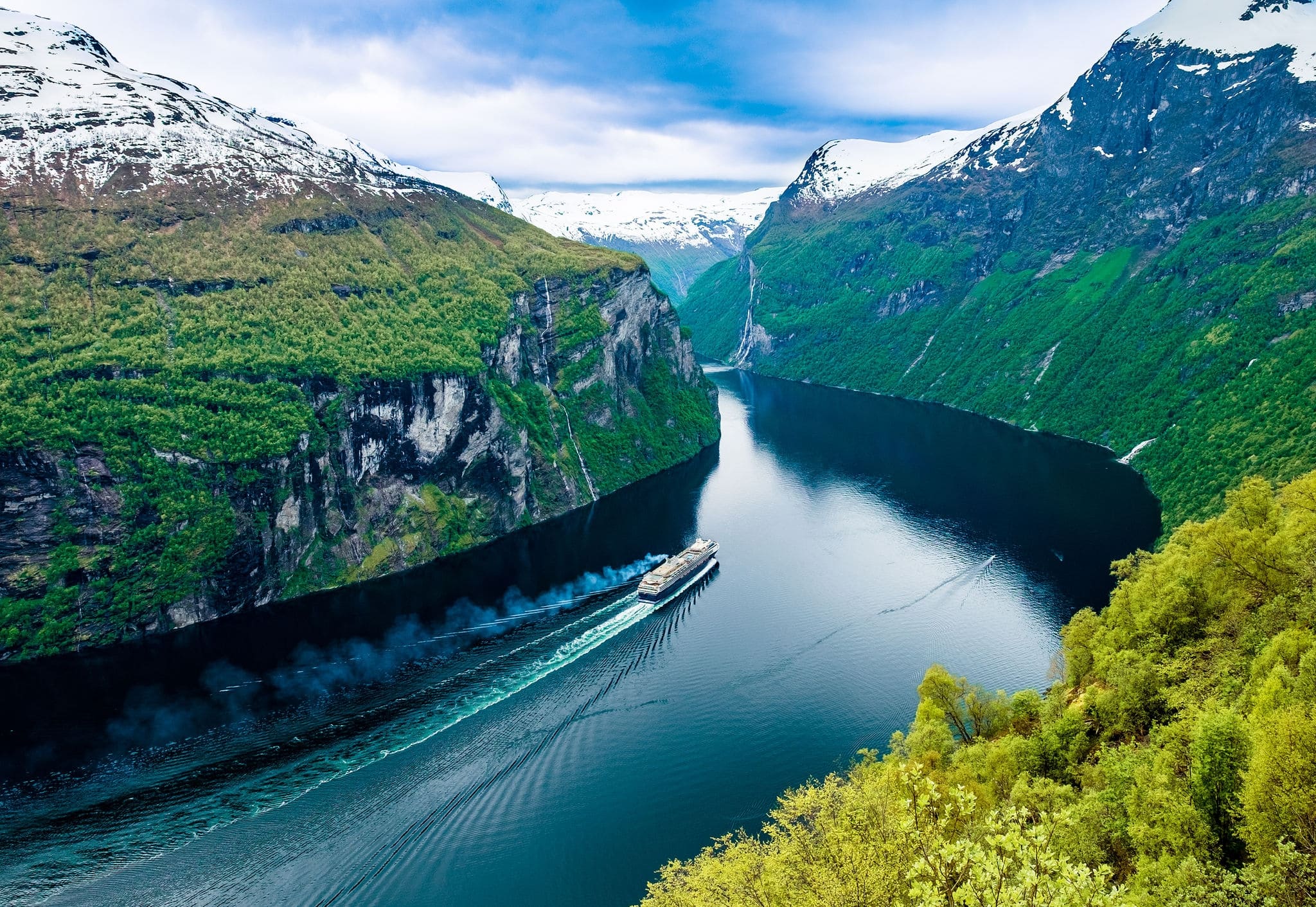 Geiranger fjord, Beautiful Nature Norway. It is a 15-kilometre (9.3 mi) long branch off of the Sunnylvsfjorden, which is a branch off of the Storfjorden (Great Fjord).