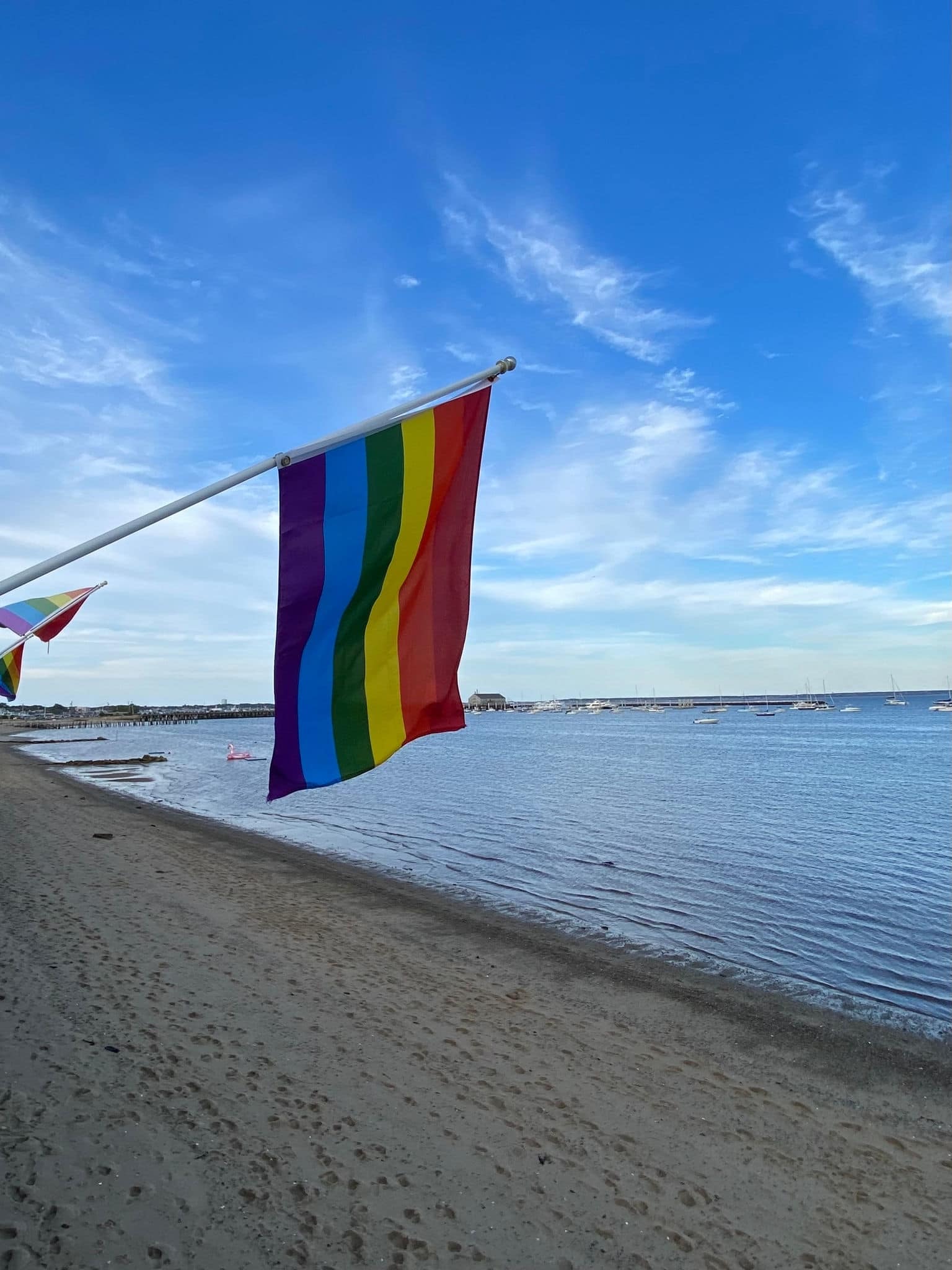 A rainbow flag at the beach in Provincetown Ma.