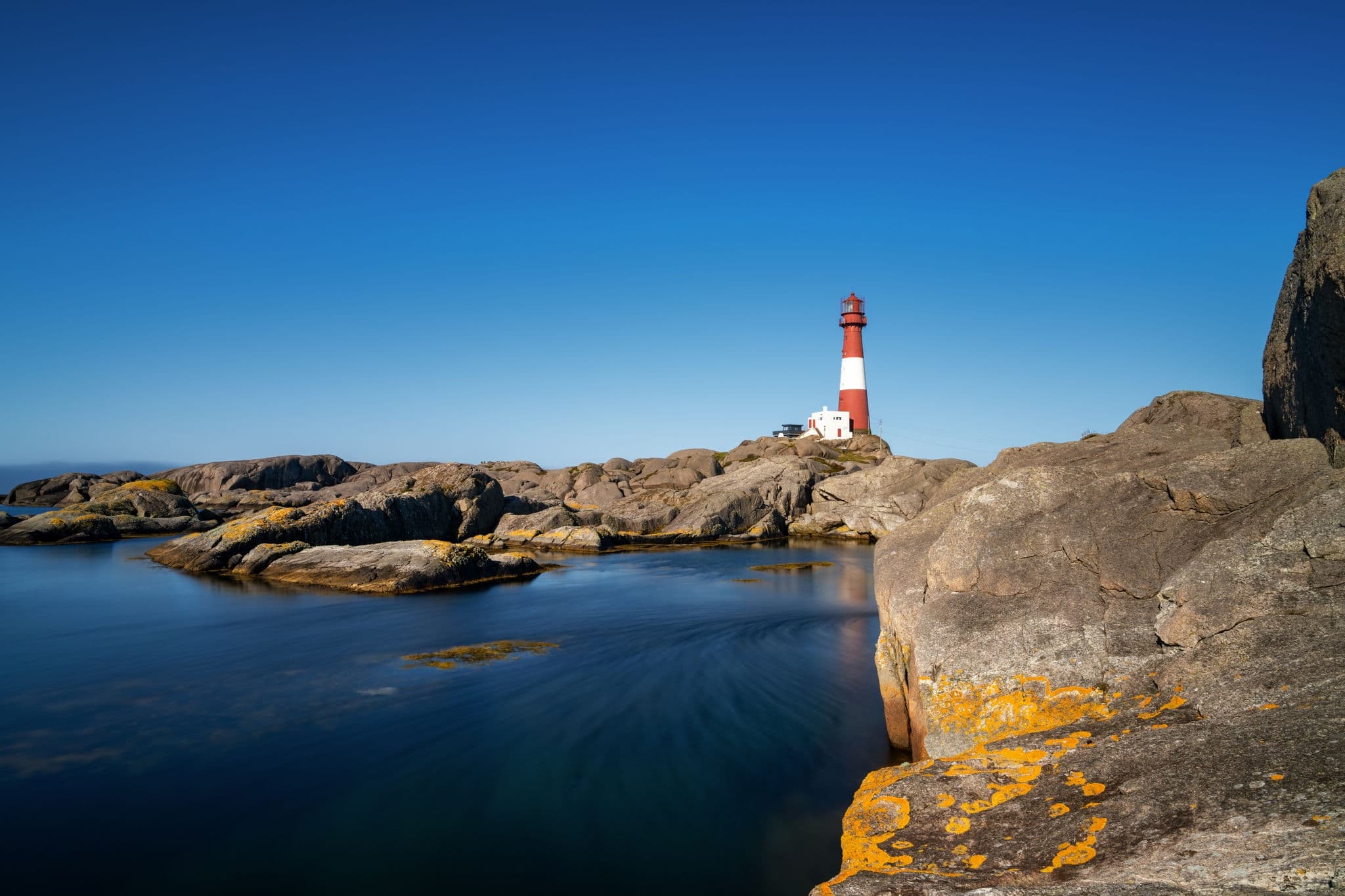 A view of the Eigeroy Lighthouse on the small island of Midbrodoya near Eigersund in southern Norway
