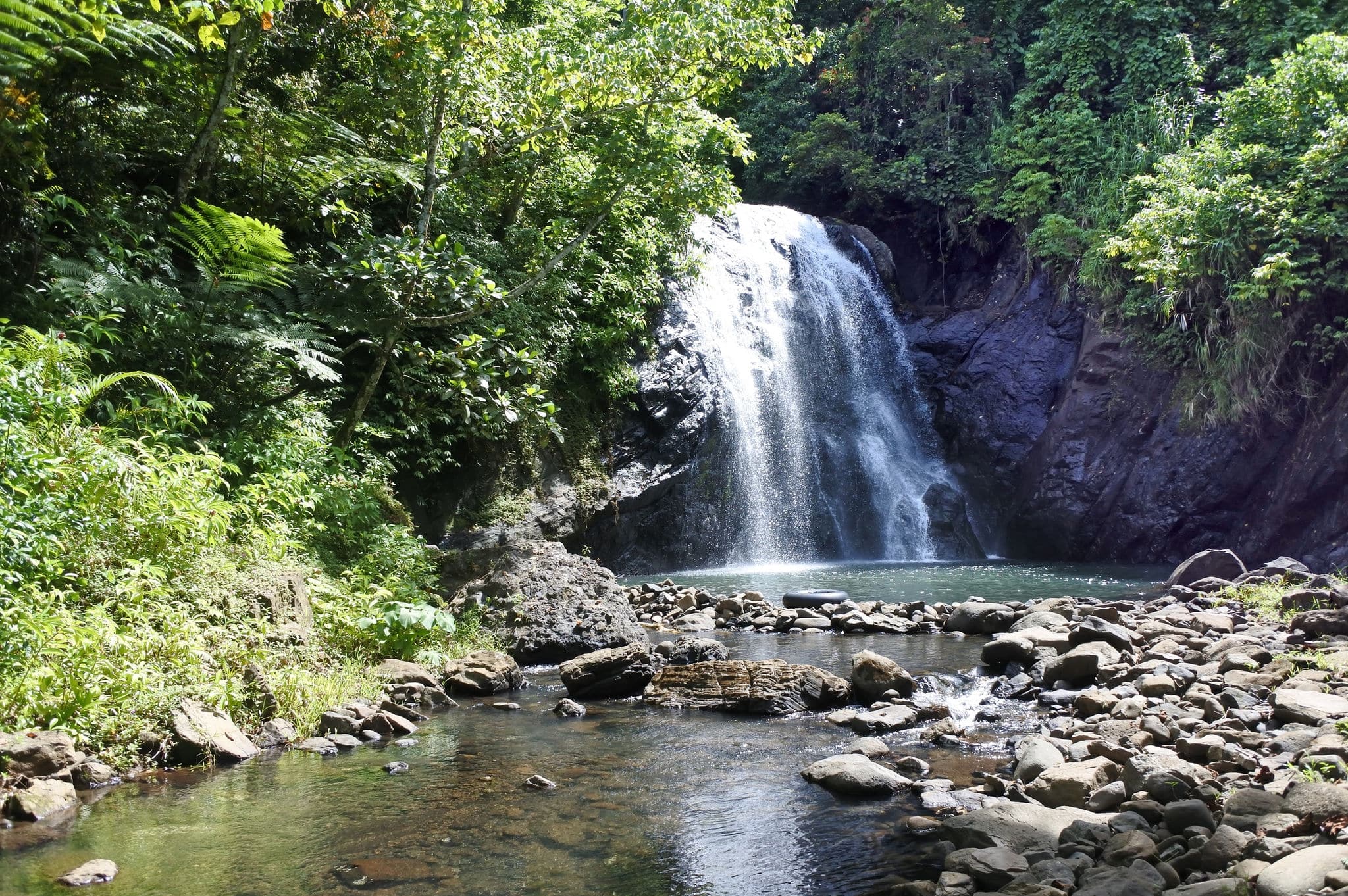 Landscape view of Vuadomo Waterfall near Savusavu town in Vanua Levu Island,  Fiji. No people. Copy space