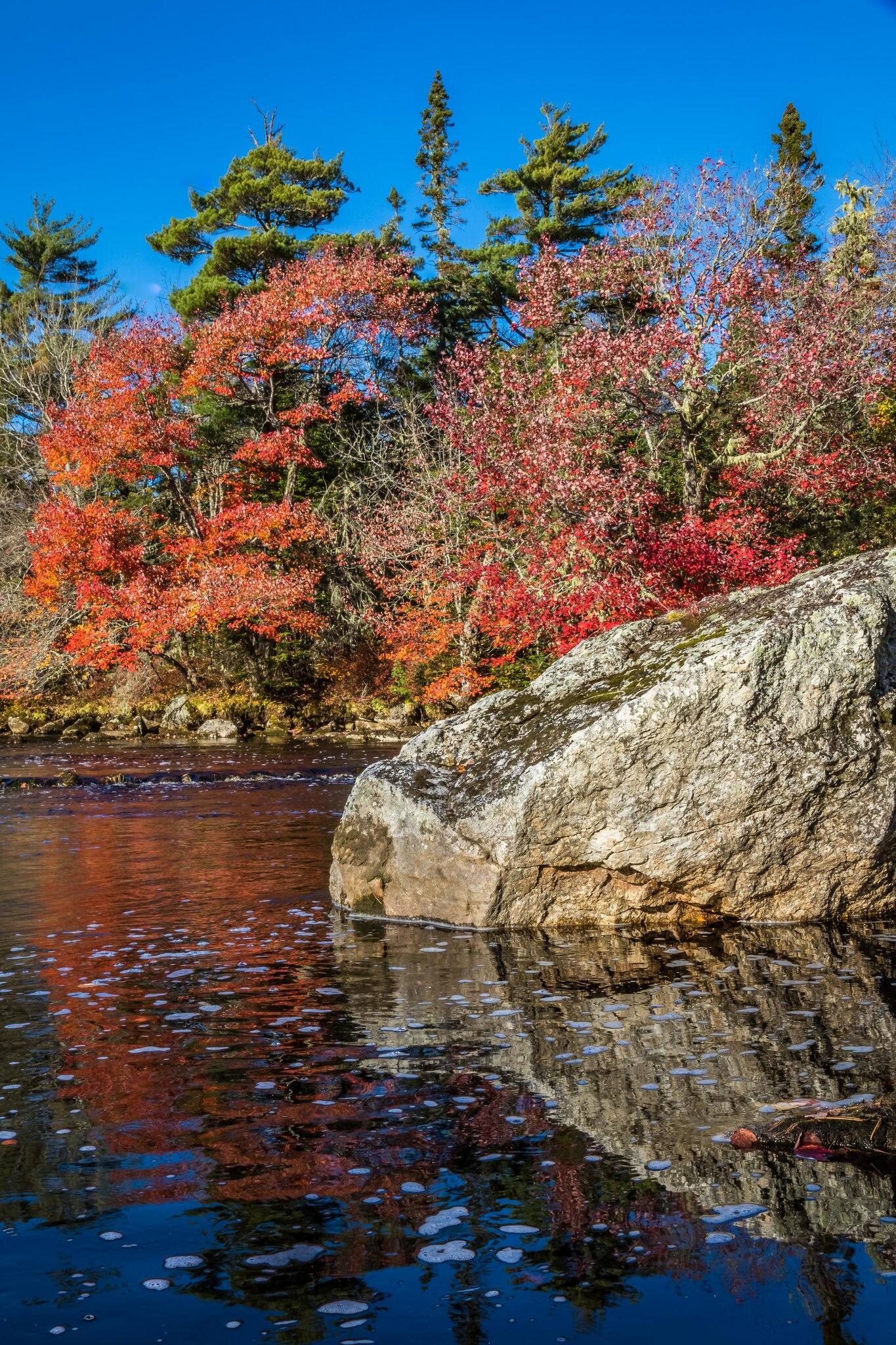 Beautiful scenery of Atlantic Canada Nova Scotia Shelburne County coastline and shorelines with a golden sky is a beauty to behold.  
