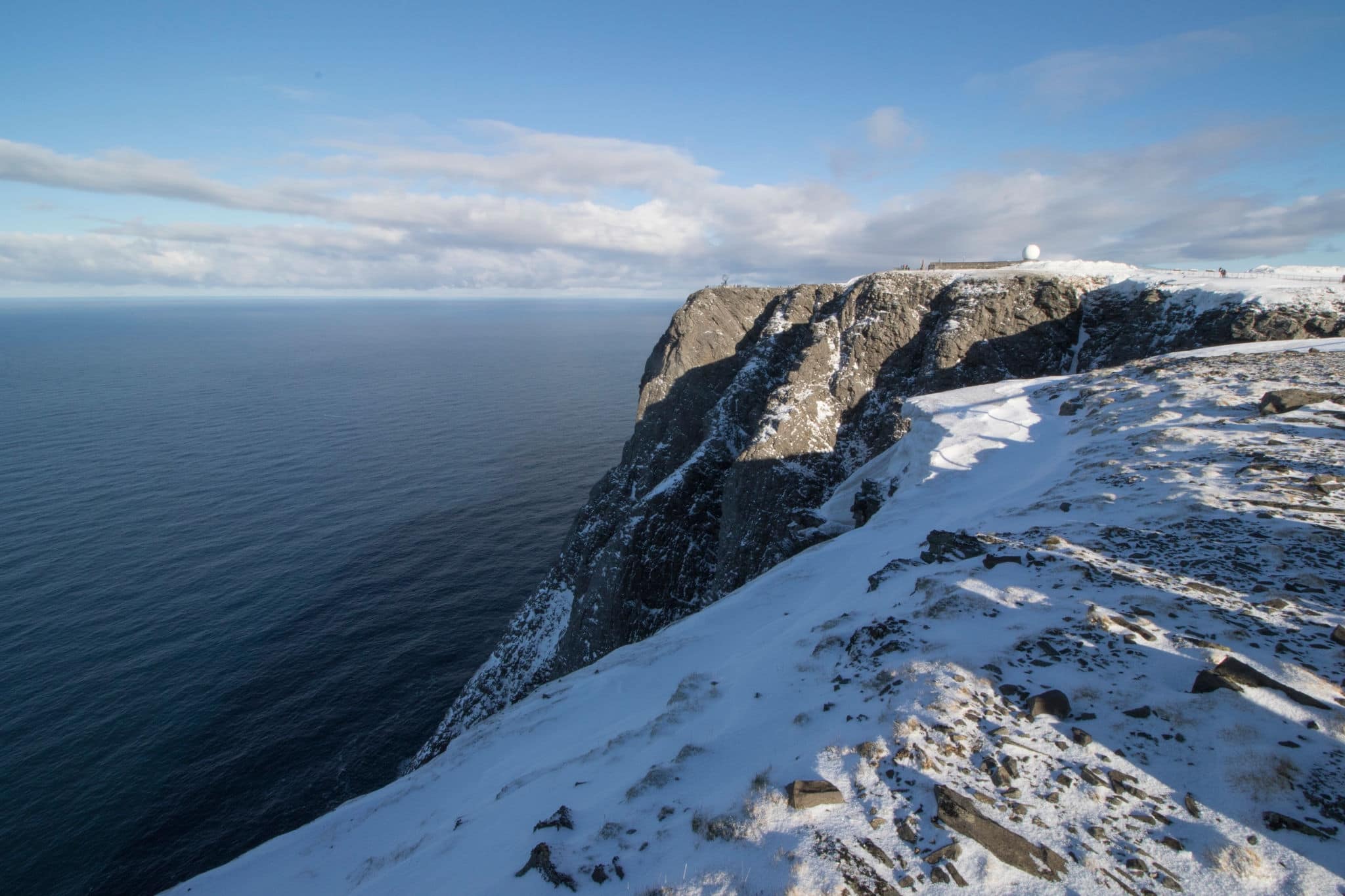 Honningsvag is the northernmost city of Norway. Nordkapp municipality Finnmark county. Norway Cliff with the metal globe in background