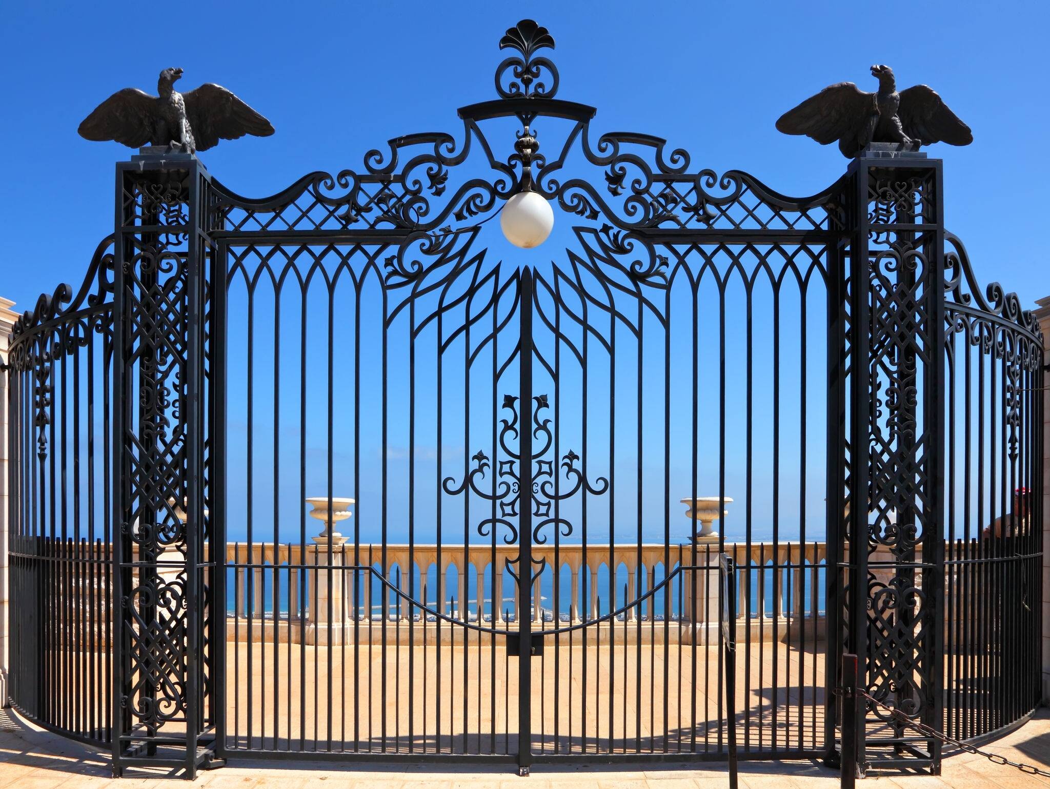 Bahai gardens forget gate and view of the Mediterranean Sea. Haifa, Israel
