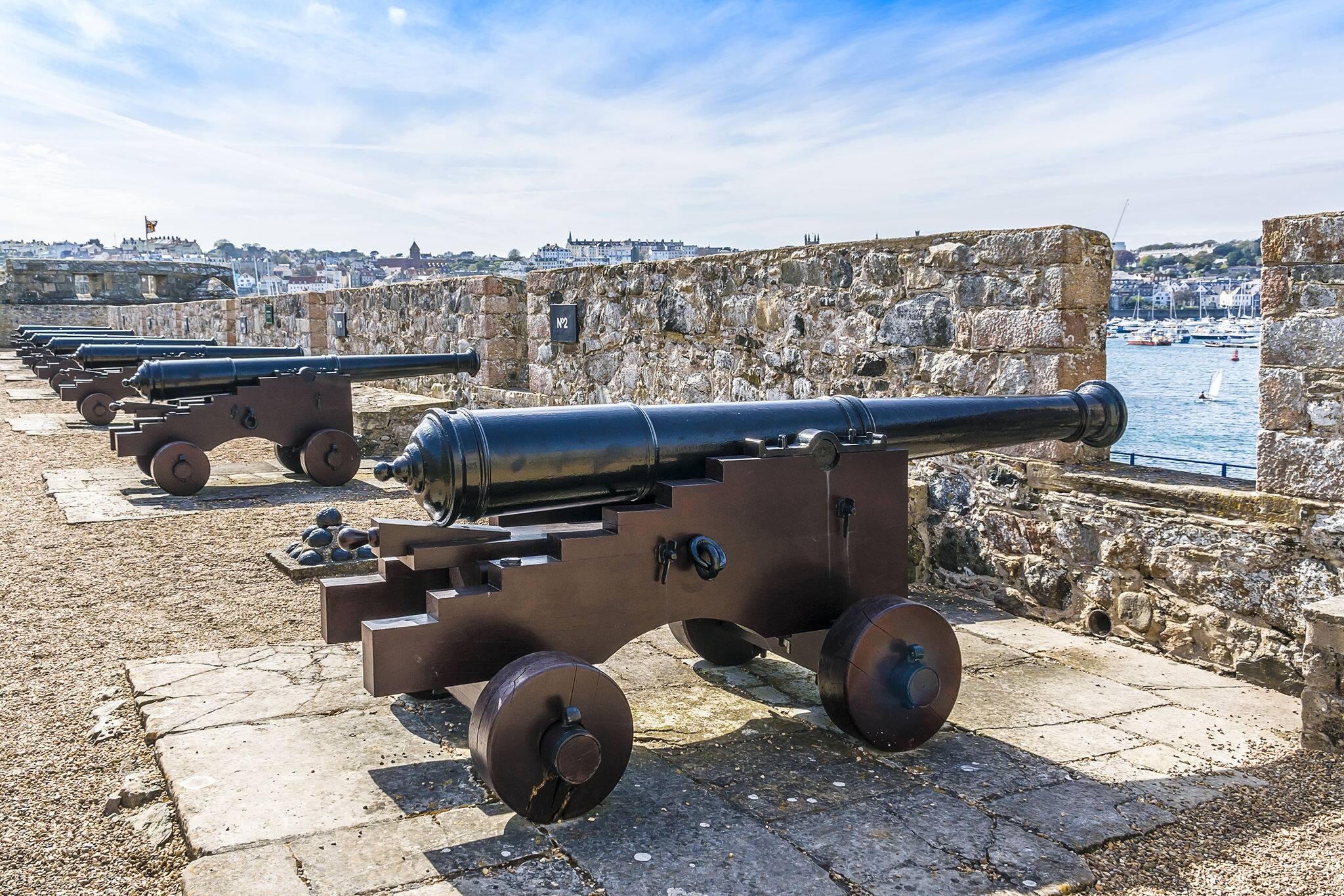 Castle Cornet has guarded Saint Peter Port and harbor for 800 years. Saint Peter Port - capital of Guernsey - British Crown dependency in English Channel off the coast of Normandy.