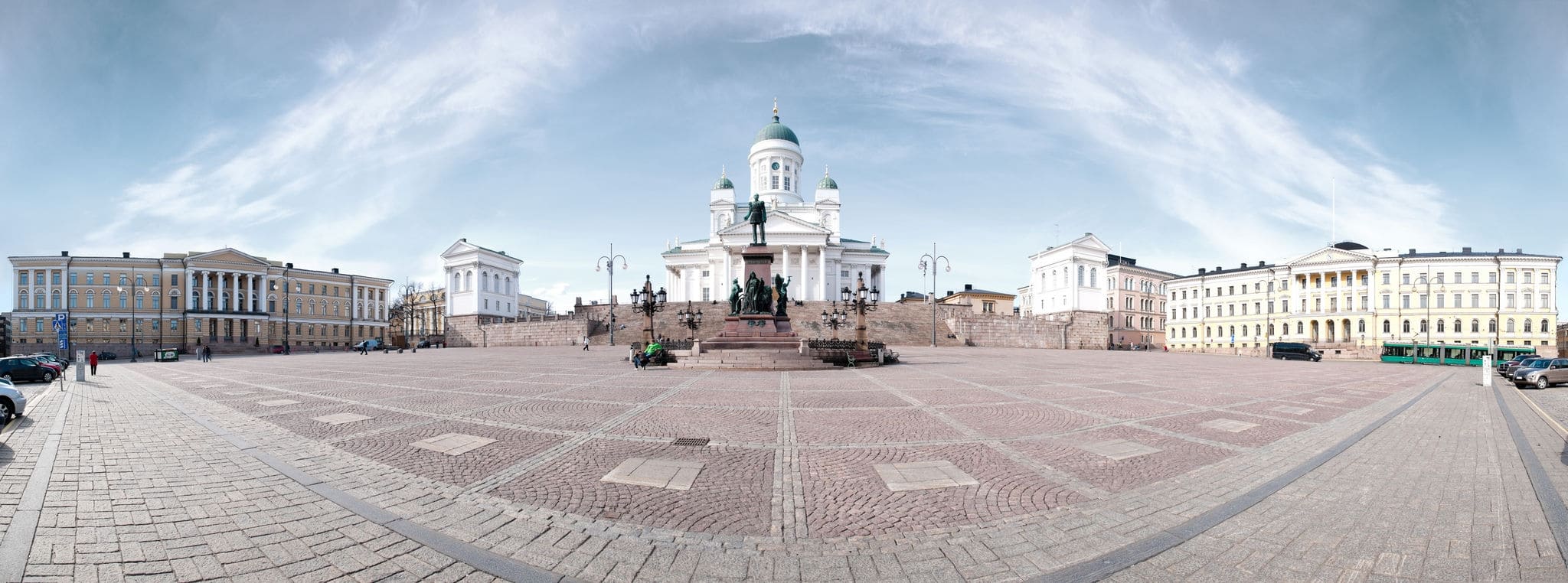 panorama view of the Helsinki cathedral square with blue cloudy sky in background