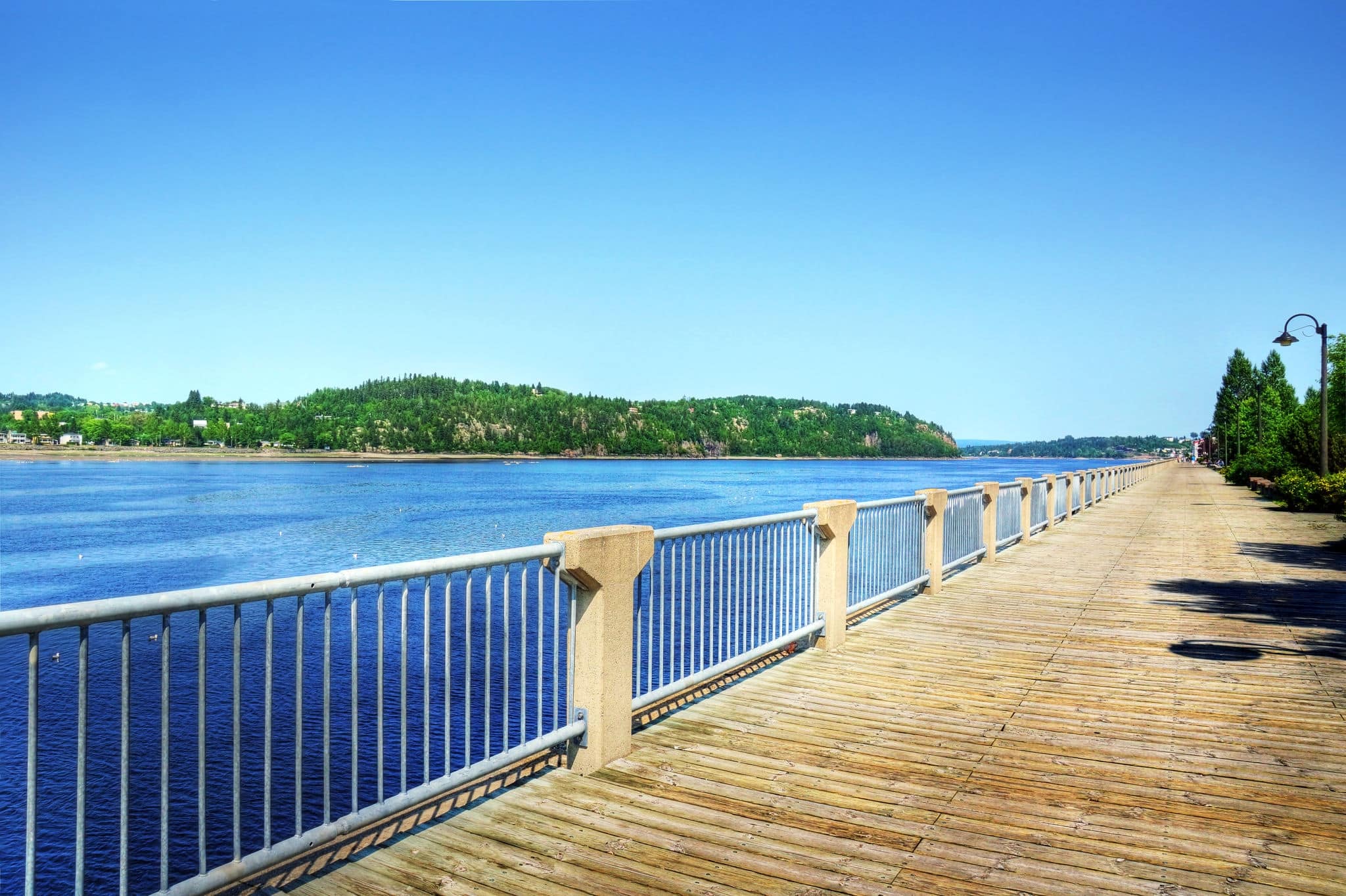 Boardwalk along the beautiful Saguenay river fjord in Quebec, Canada
