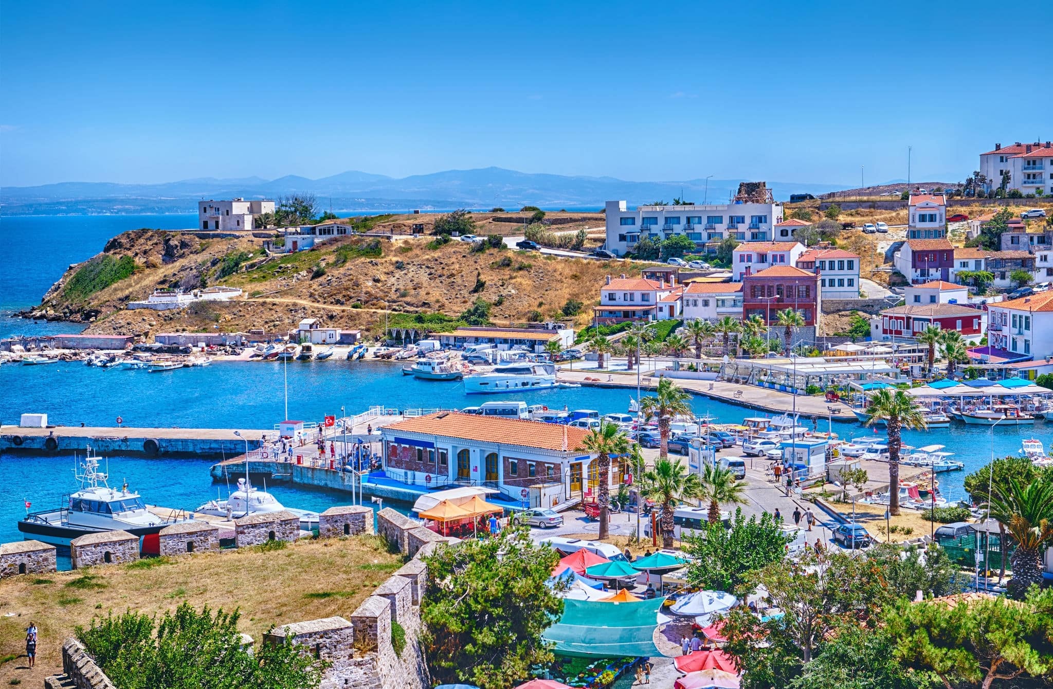 Bozcaada View of the port, fortress, Aegean Sea, promenade, shops and restaurants.