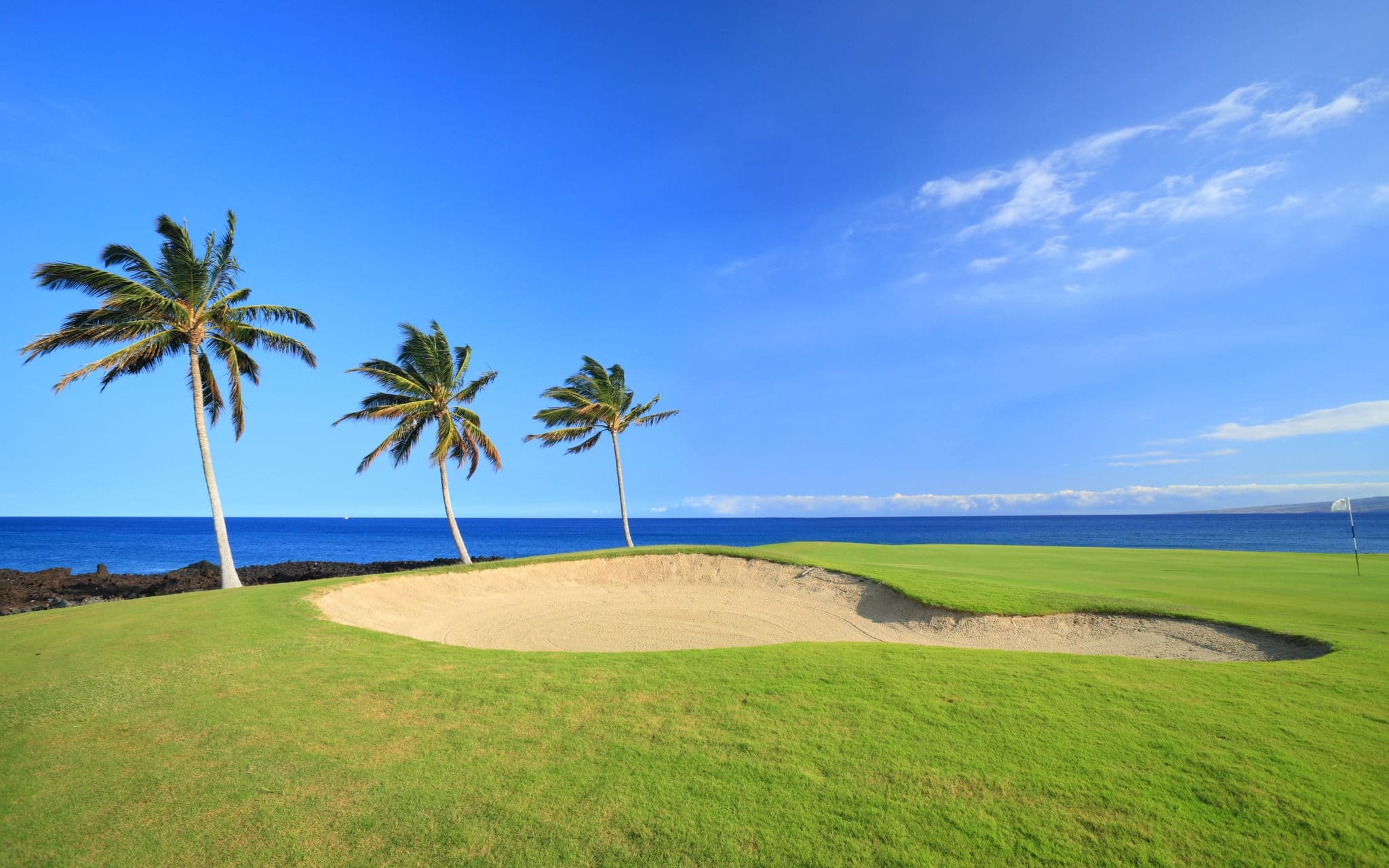 Green Hawaiian Golf Course on Lava Ocean Shore of Kona Island