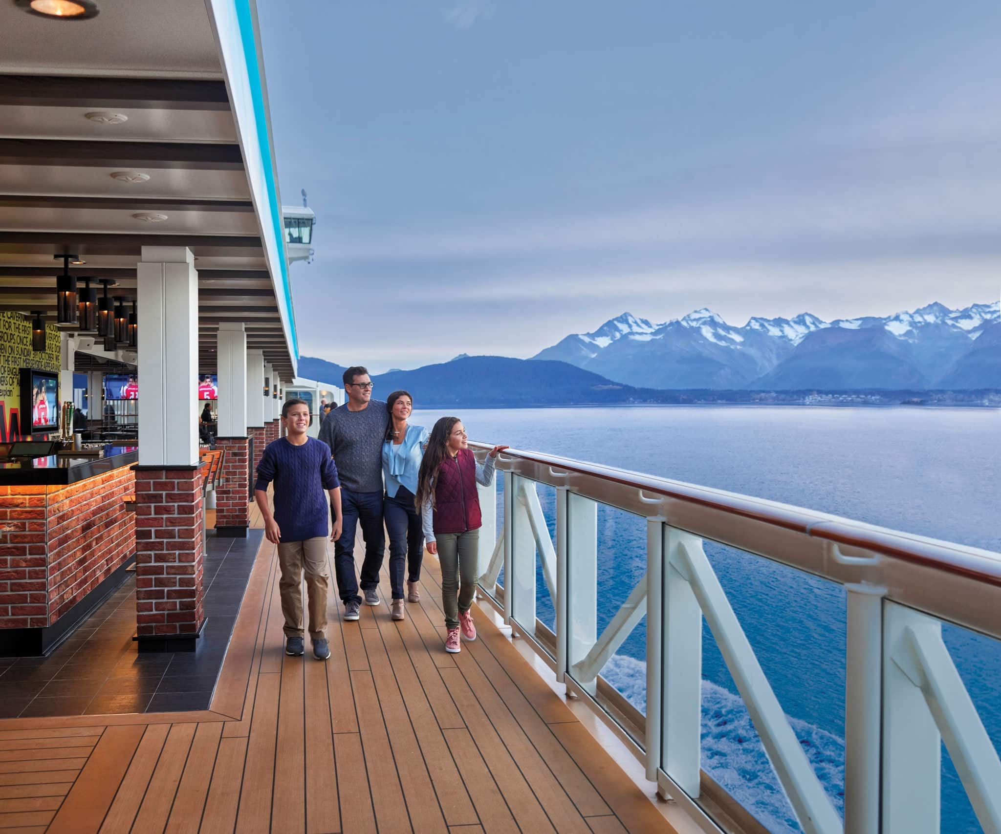 Family walking on Waterfront on Norwegian Bliss. 
