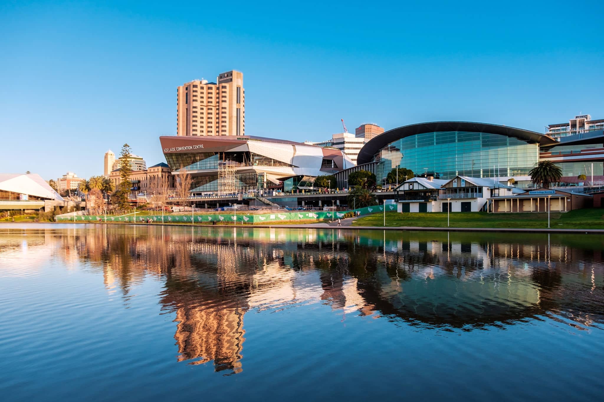Adelaide, Australia - September 11, 2016: Adelaide city centre viewed from the north side of Torrens river in Elder Park on a bright day