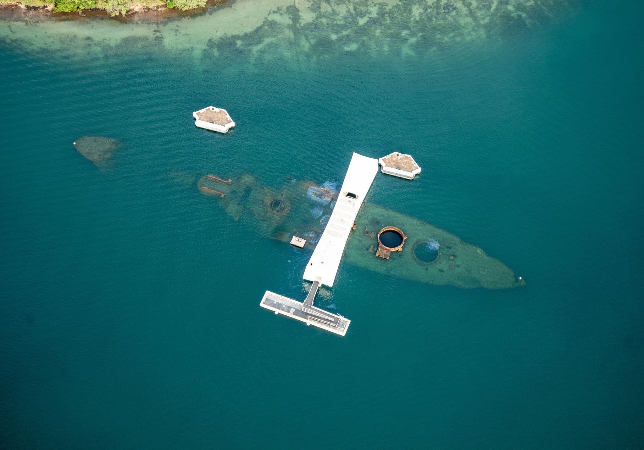 Aerial view of the USS Arizona Memorial at Ford Island, Joint Base Pearl Harbor-Hickam, Hawaii Oct. 11, 2023. 