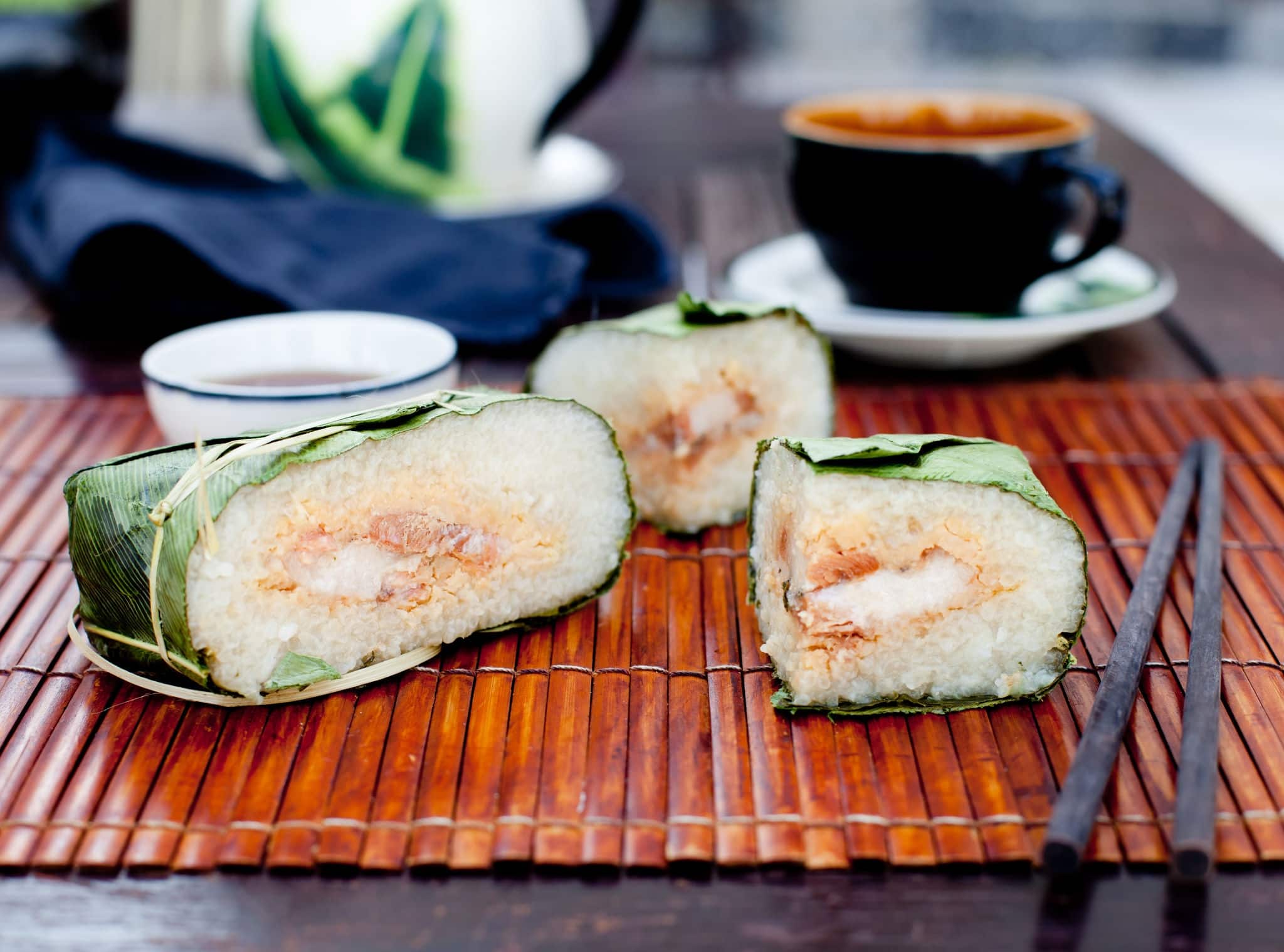 Banh chung, Traditional present for Lunar New Year, Vietnamese traditional dish. Sticky rice cake with meat , covered with banana leaves and, tied with bamboo rope 