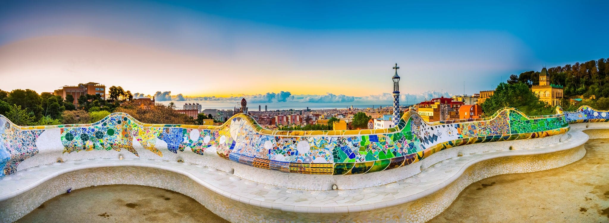 Barcelona at sunrise viewed from public park Guell, Spain