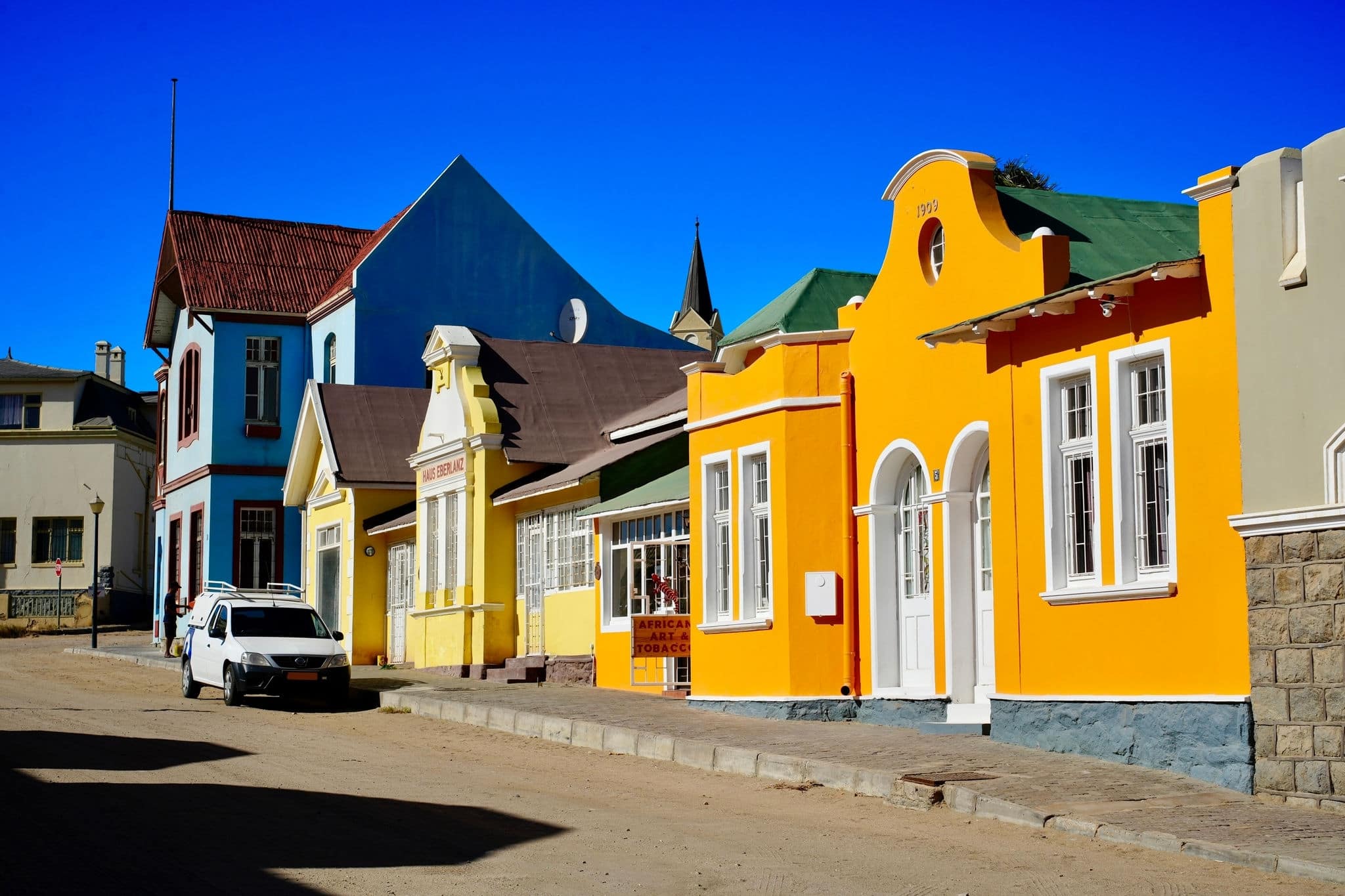 Colourful painted German colonial-era houses in Bergstrasse, Luderitz, Namibia