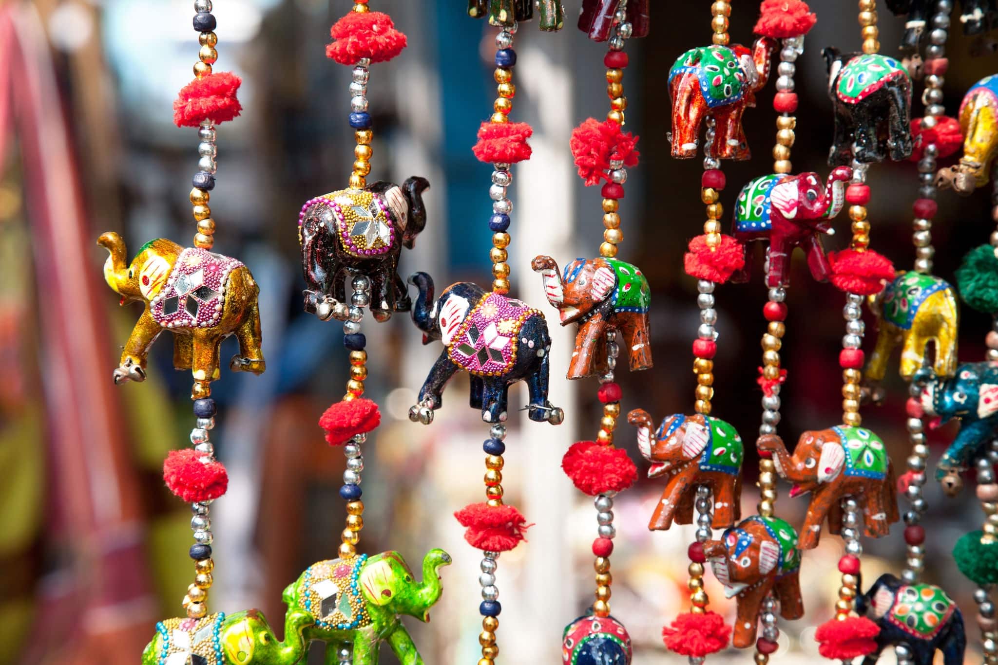 Various of decorative elephants from wood in different colors in Mattancherry Market in Kochi, Kerala, India