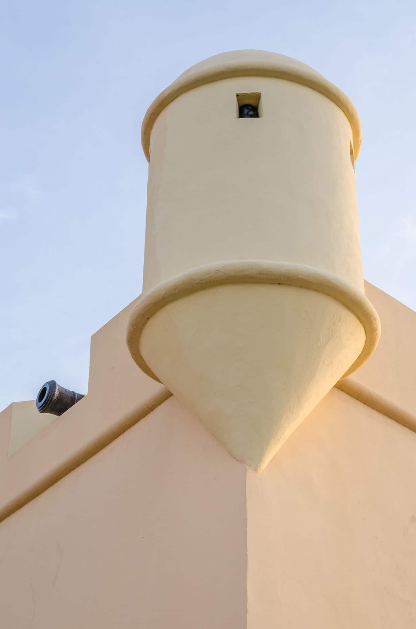 Historical building and tourist attraction Fortress of Sao Miguel with round watch tower in capital city Luanda, Angola