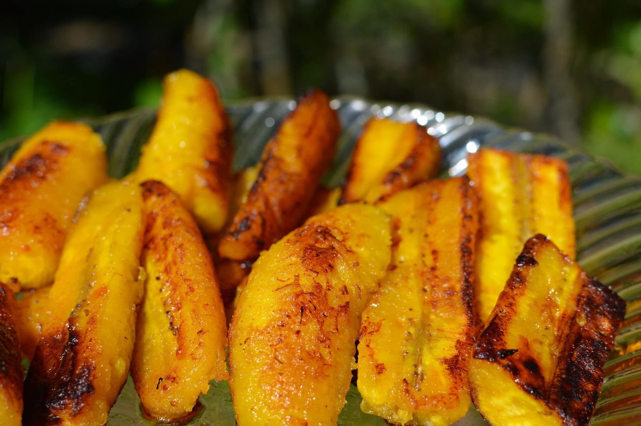 Ripe fried plantain - local banana served for breakfast or separately with sour cream in Guatemala and other countries of Central America
