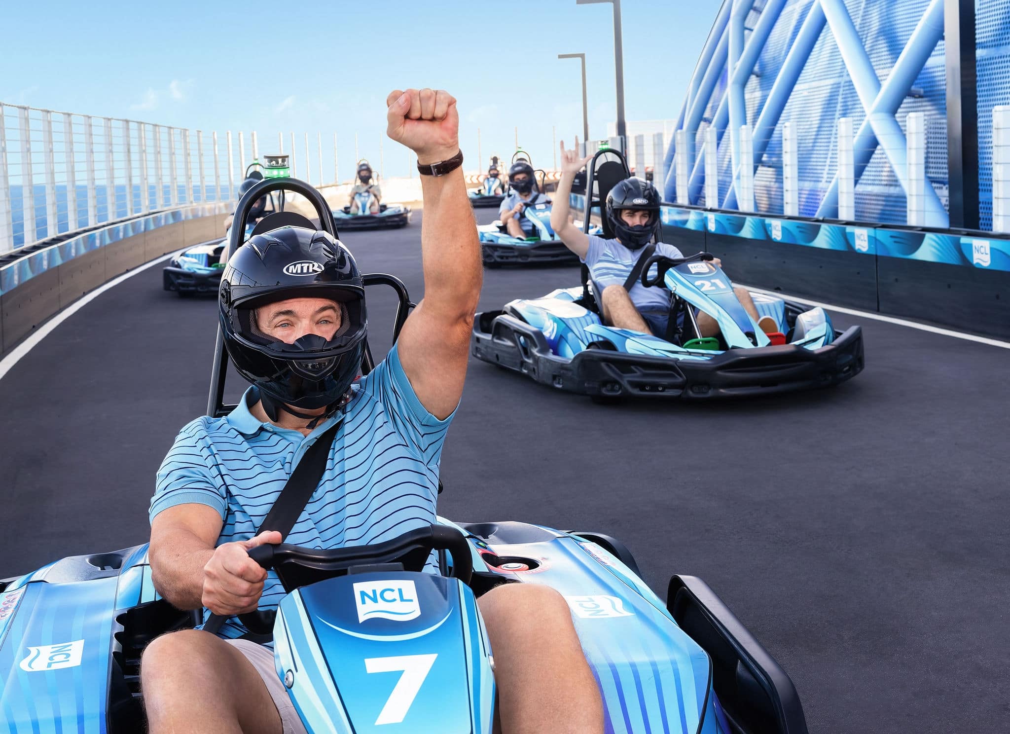 Family playing mini golf on cruise ship
