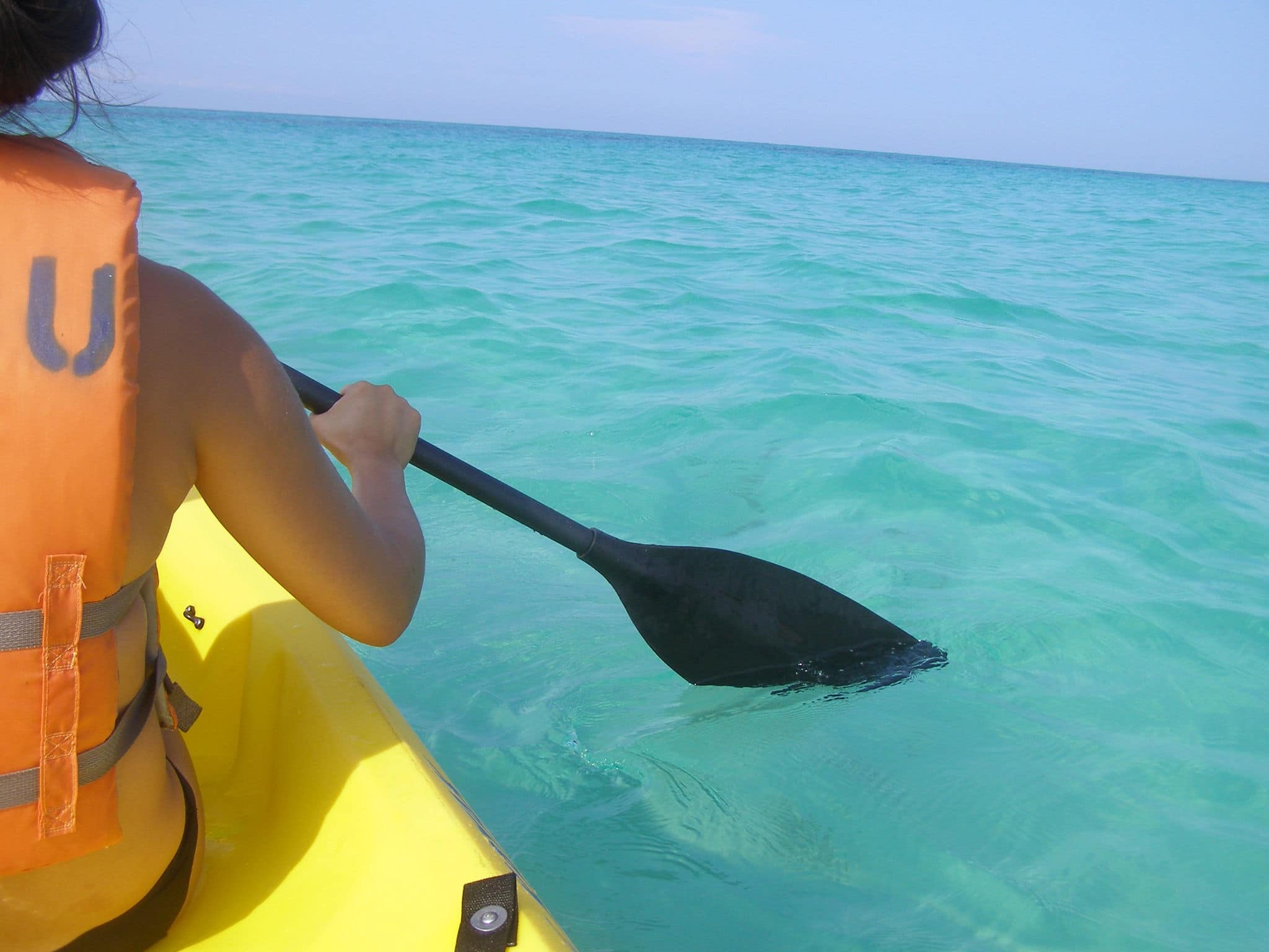 Kayaker on open water in the Gulf of Mexico.