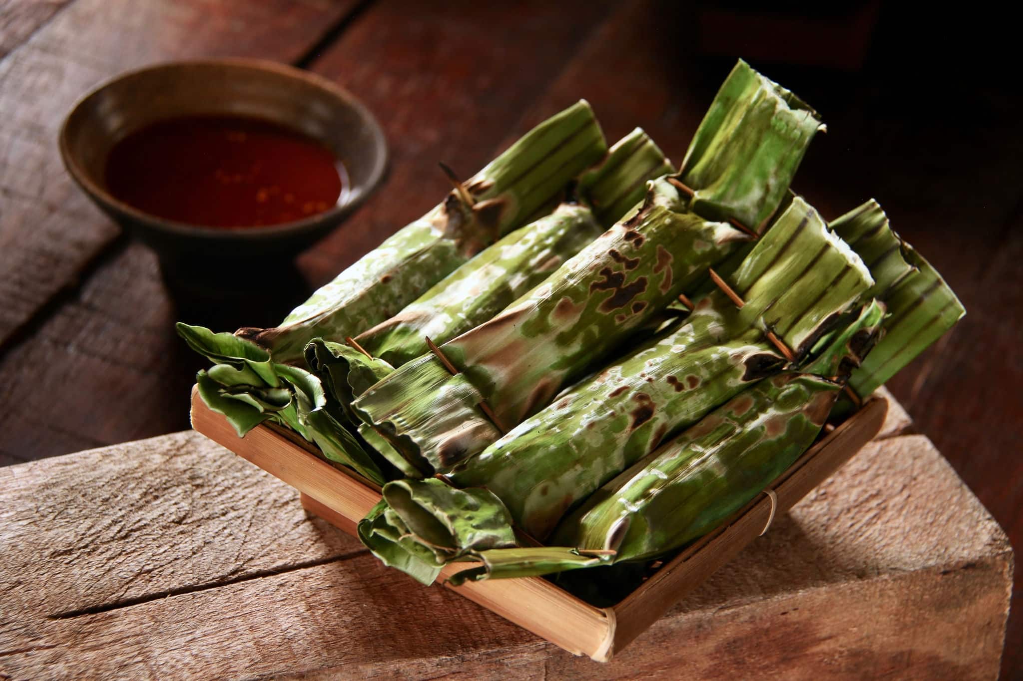Otak otak Palembang. Traditional Palembang snack of grilled fish cakes wrapped with banana leaf.