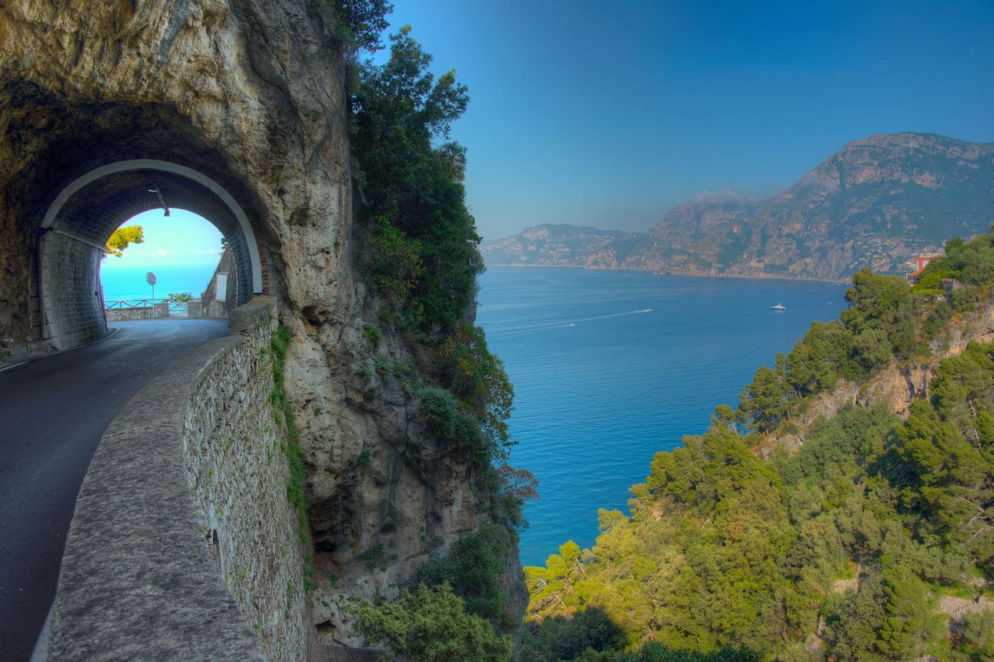 Natural landscape of Costiera Amalfitana coastline viewed from Sentiero degli Dei hiking trail in Italy.