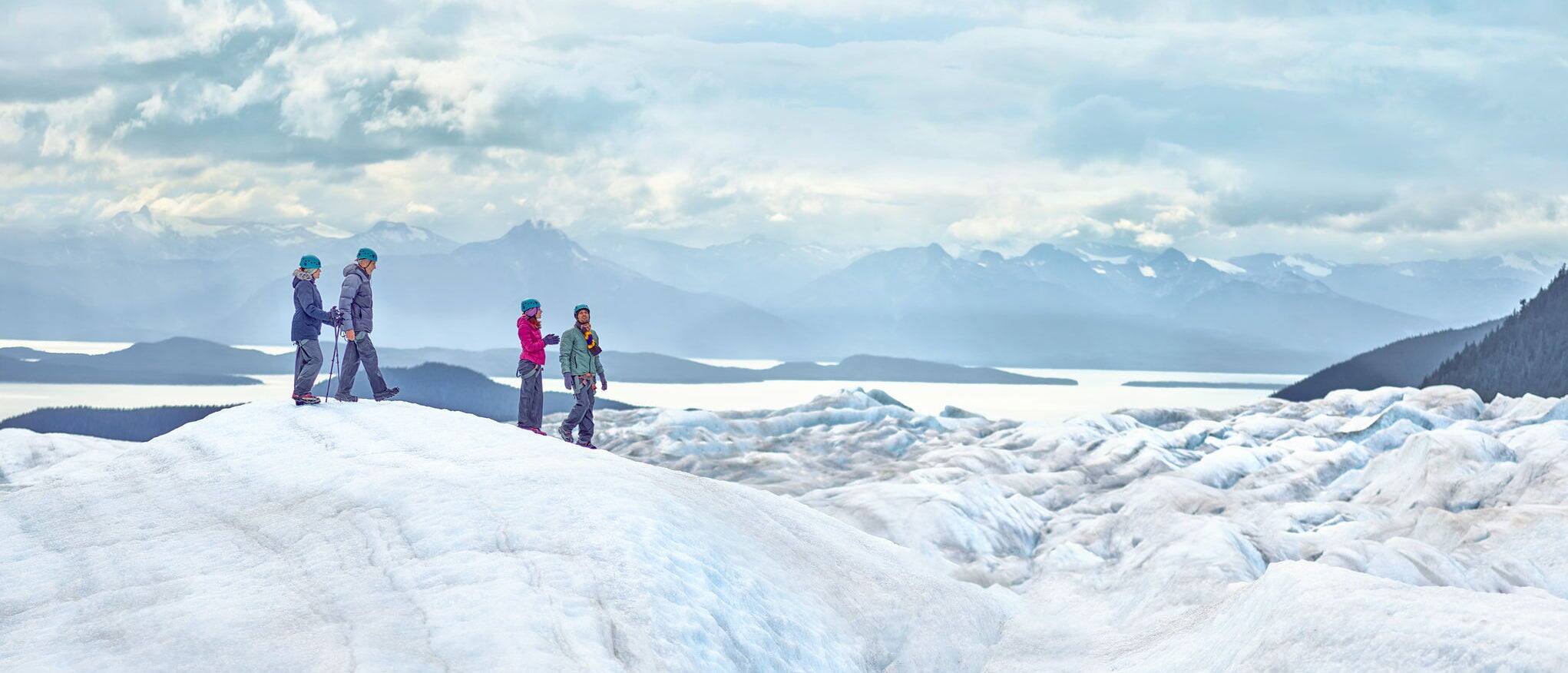 Group walking on glaciers in Alaska. 