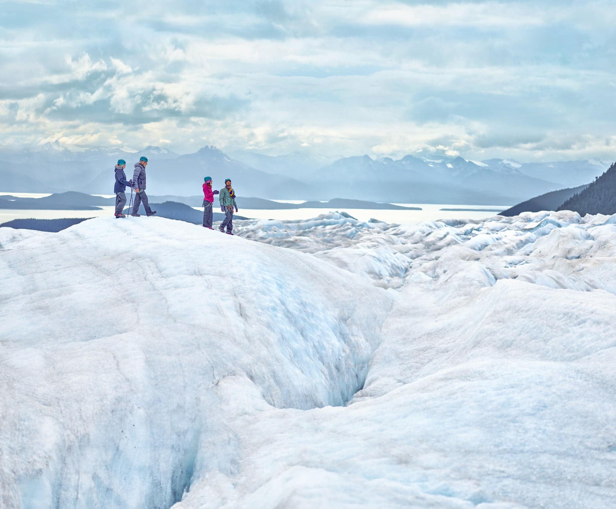 Group walking on glaciers in Alaska. 