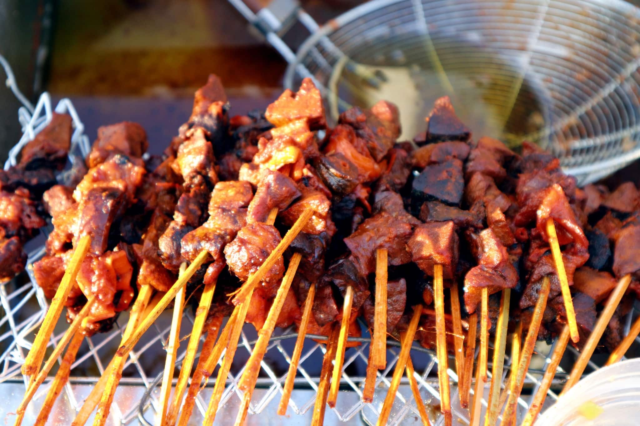 Photo of deep fried beef lungs called locally as Bopis in barbecue sticks sold at a street food stall