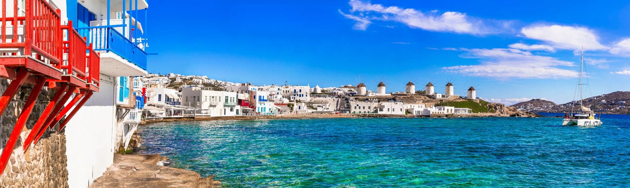 Greece travel. Luxury island Mykonos. panorama of "Little Venice"  , view of windmills. Summer greek holidays, Cyclades