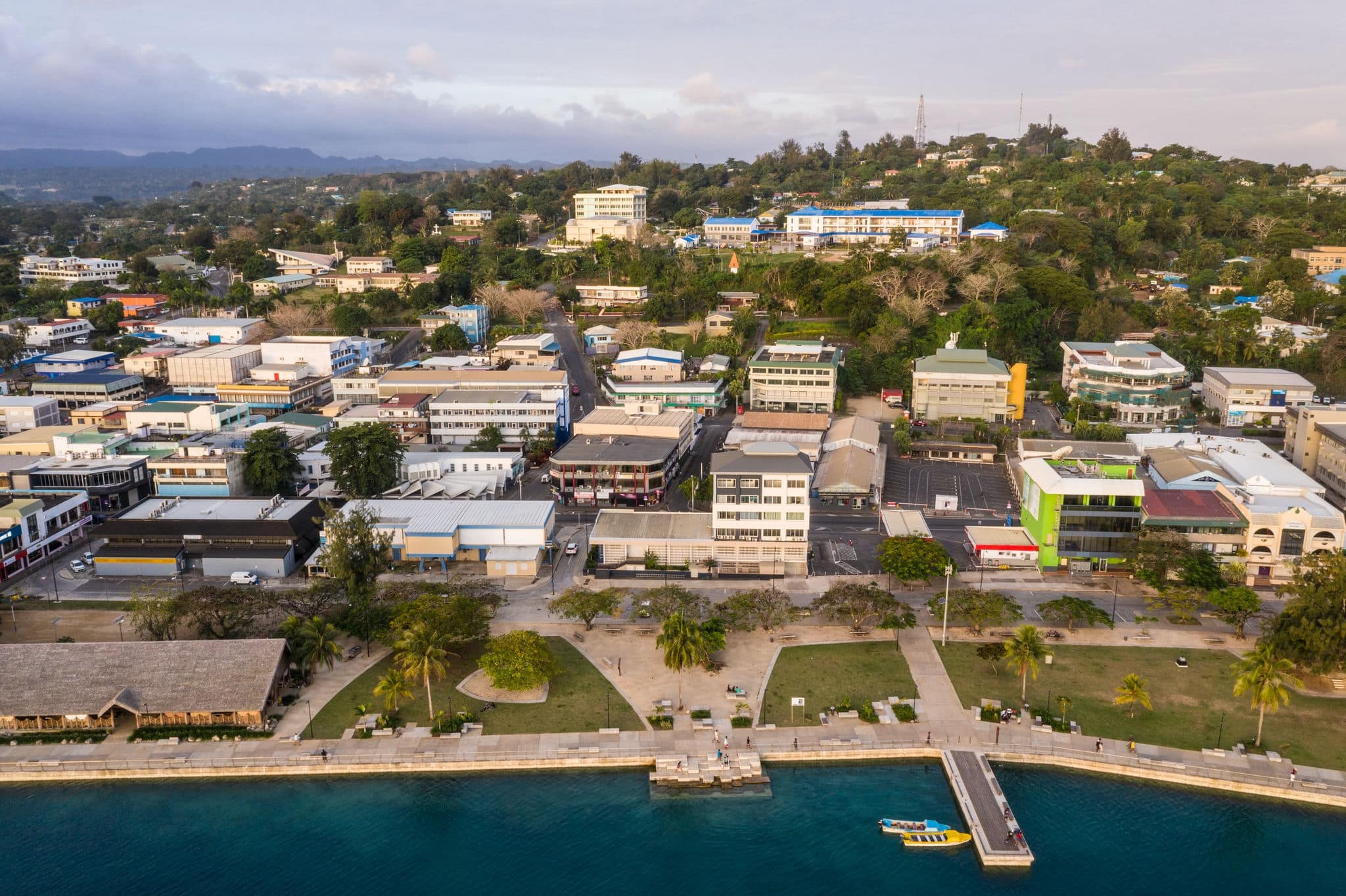 Aerial view of Port Vila city center with the waterfront promenade and the seawall public park in Vanuatu capital city in the Pacific.