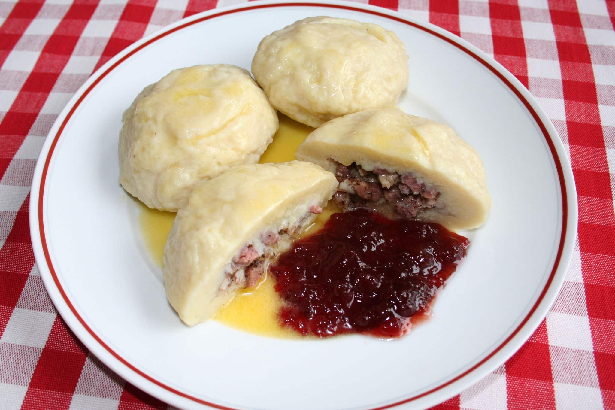 Swedish dish "kroppkakor" with bacon and whortleberry